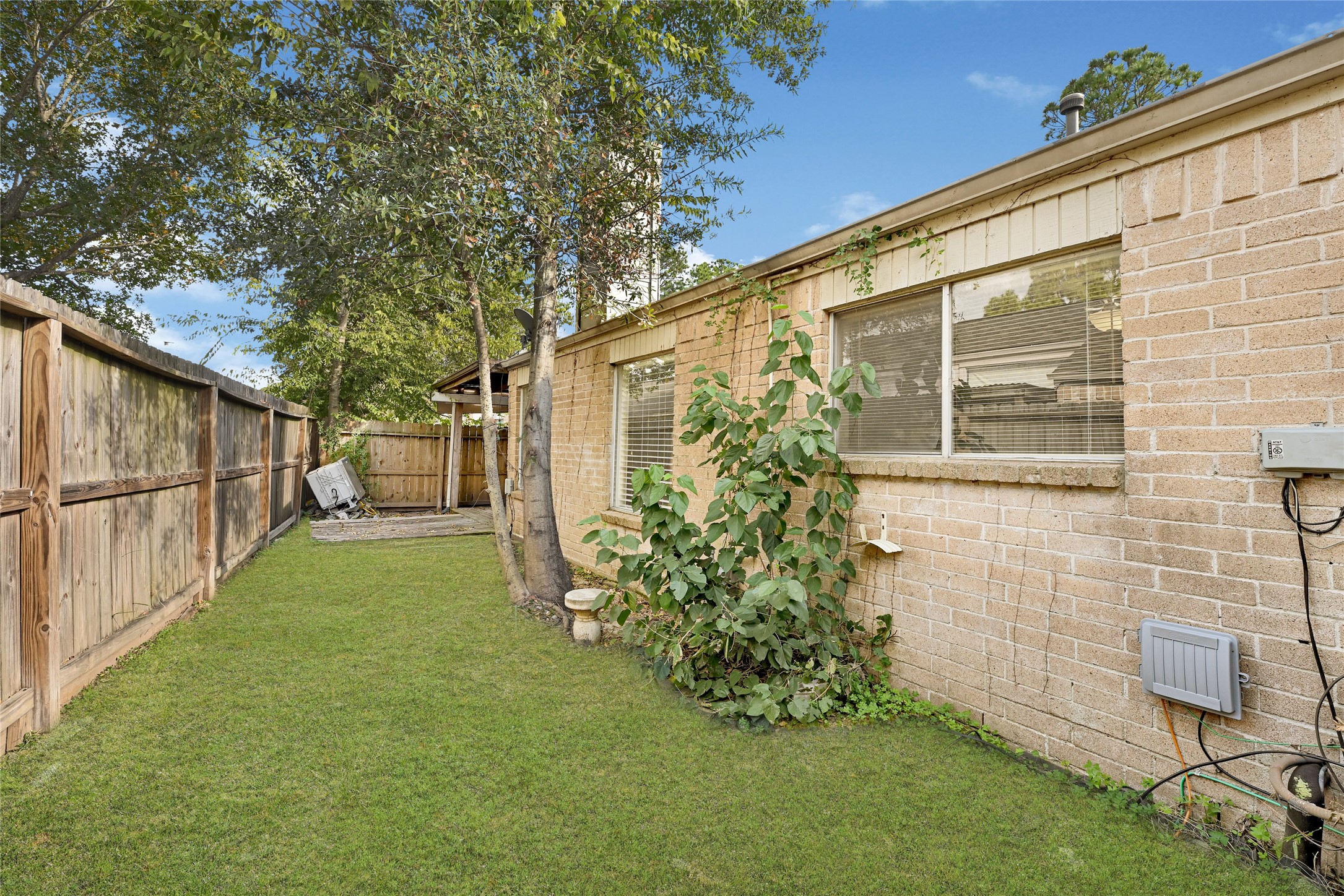 18562 Meadows Way Drive Houston, TX 77084 - Photo 8 of 11 a view of a back yard of the house