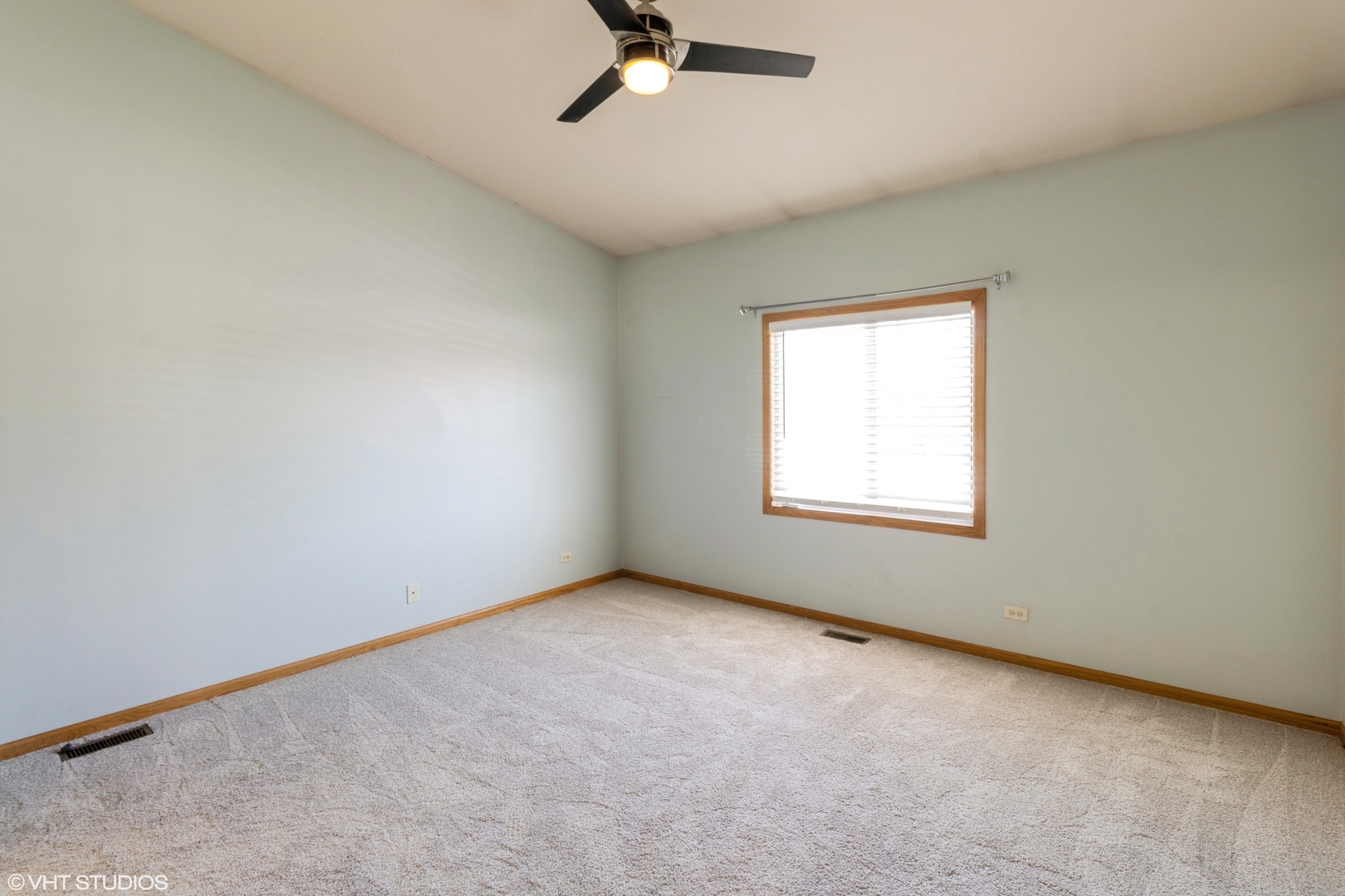 1326 Dancing Bear Lane Elgin, IL 60120 - Photo 15 of 28 an empty room with a window and a ceiling fan