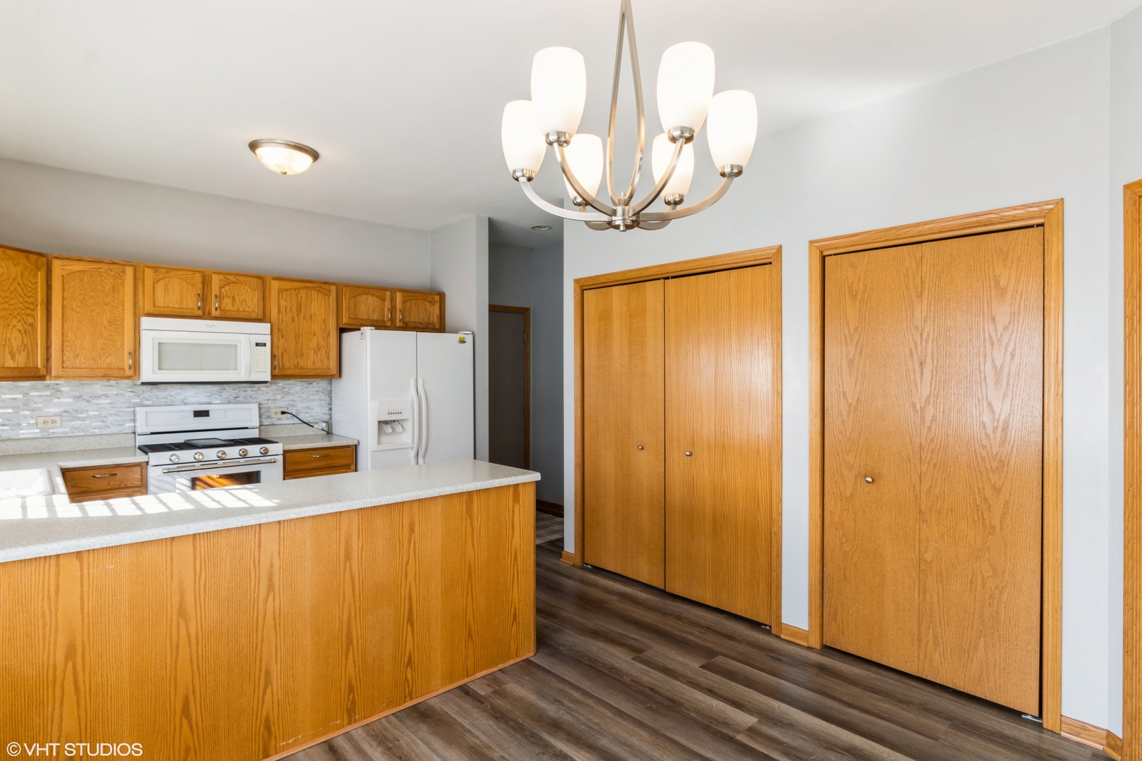1326 Dancing Bear Lane Elgin, IL 60120 - Photo 8 of 28 a room with stainless steel appliances granite countertop a couch