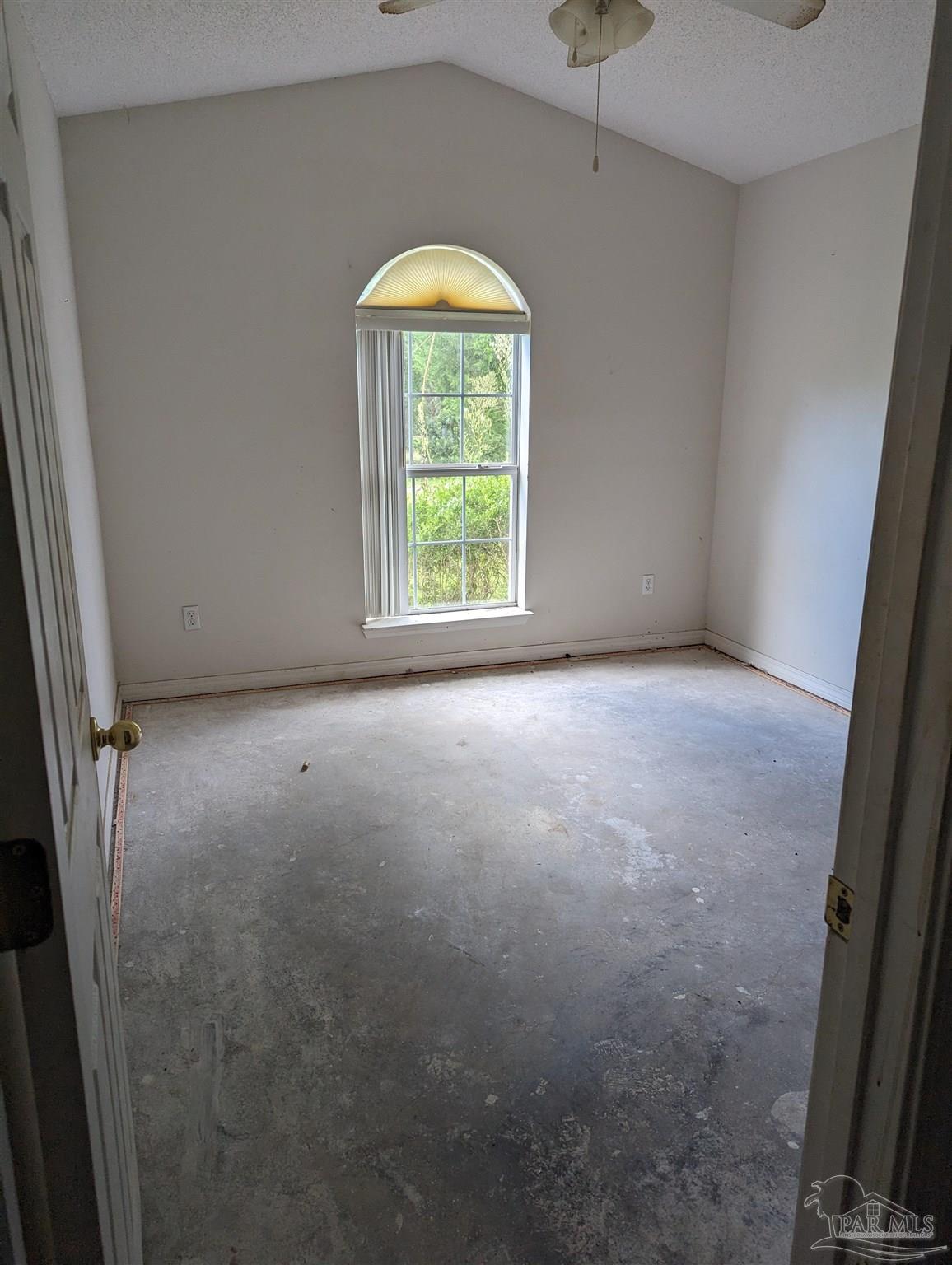 7759 Erudition Avenue Milton, FL 32583 - Photo 20 of 22 an empty room with a window