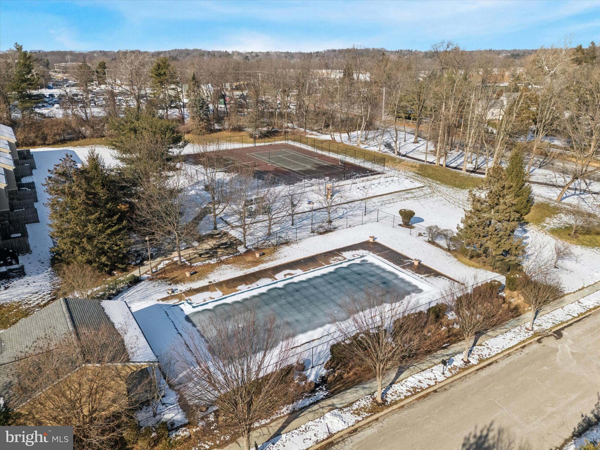 94 Ramsgate Court, Unit 210 U94 Blue Bell, PA 19422 - Photo 21 of 24 Large Pool Area & Tennis Court