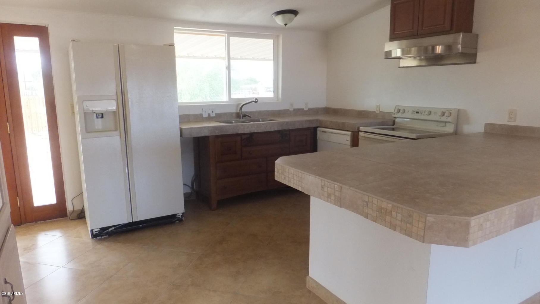 19701 West Rustler Road Buckeye, AZ 85326 - Photo 11 of 17 Kitchen 2
