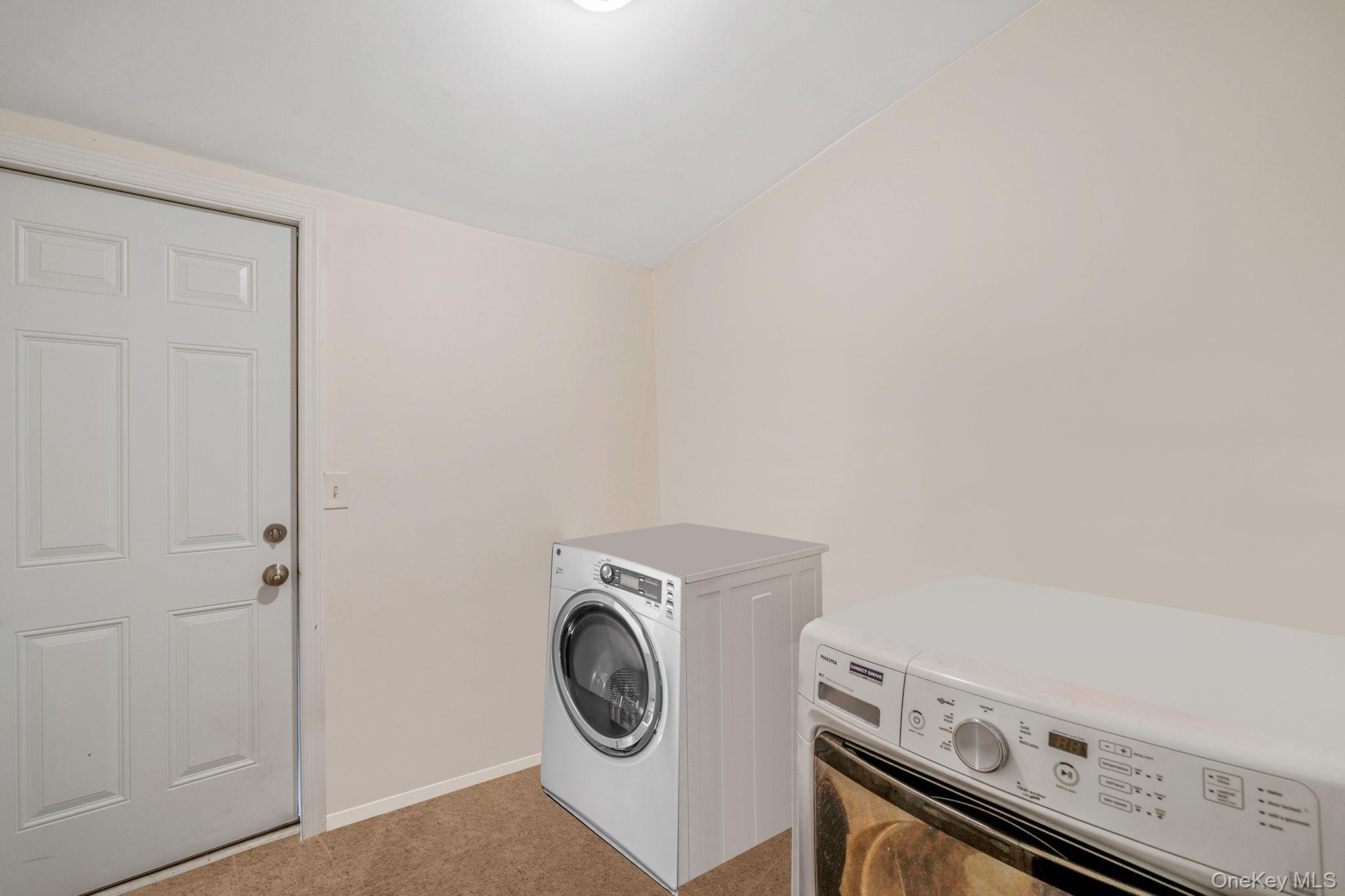 15 Sayville Road Mastic Beach, NY 11951 - Photo 17 of 25 a utility room with dryer and washer