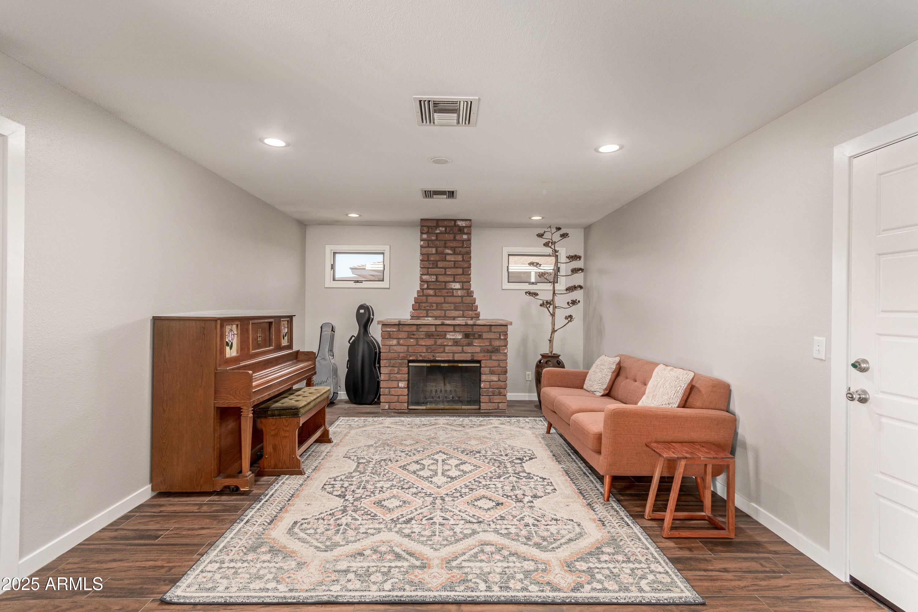 1506 East Gemini Drive Tempe, AZ 85283 - Photo 11 of 42 Bonus room with fireplace