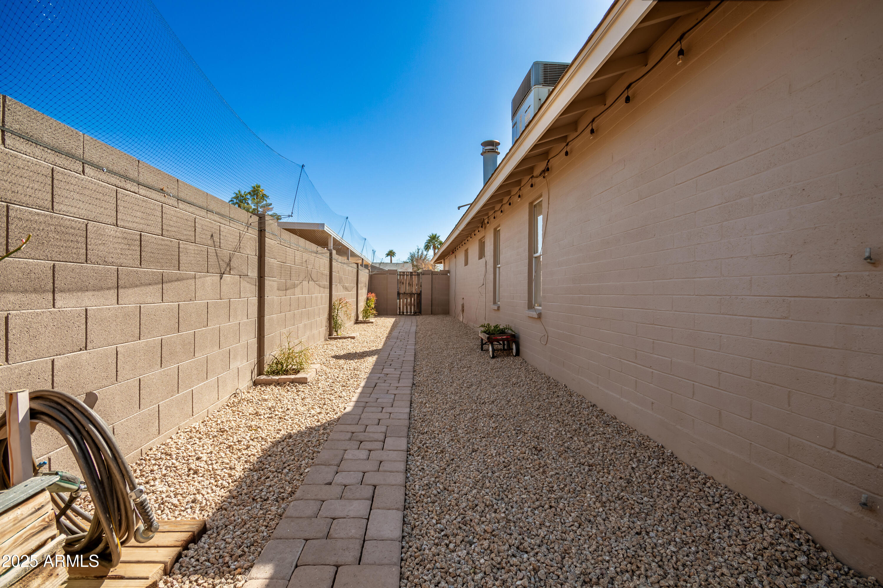 1506 East Gemini Drive Tempe, AZ 85283 - Photo 41 of 42 Sideyard with pavers