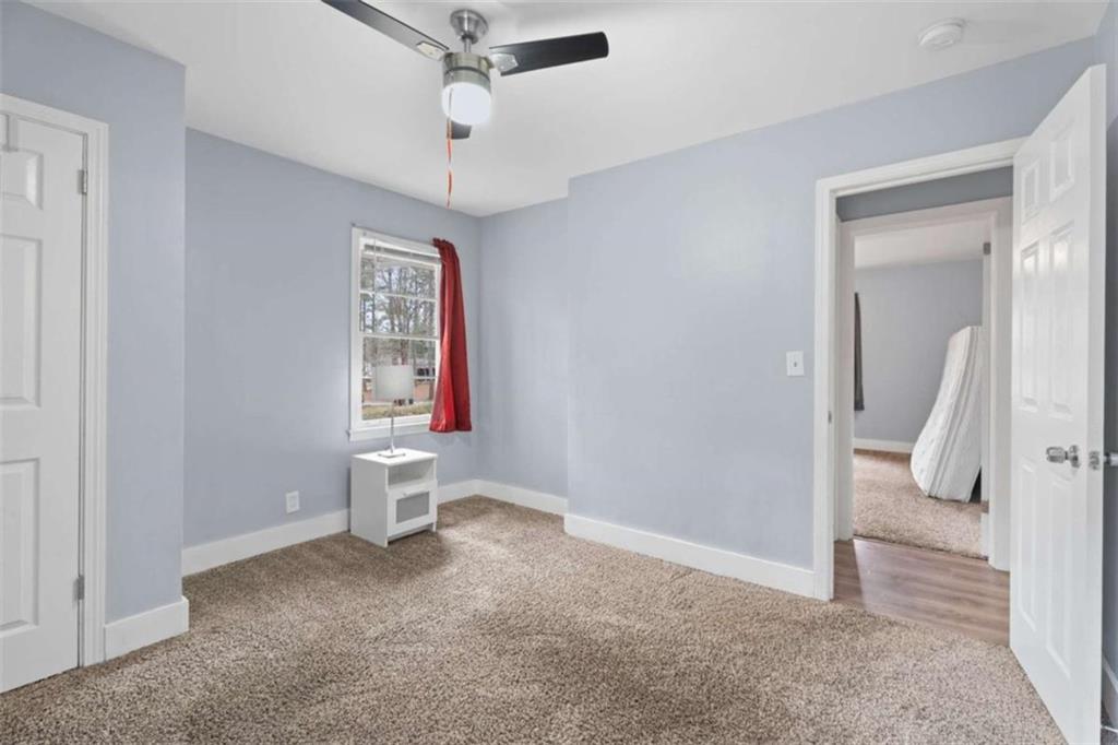 1621 North Columbia Place Decatur, GA 30032 - Photo 12 of 33 wooden floor in an empty room with a window