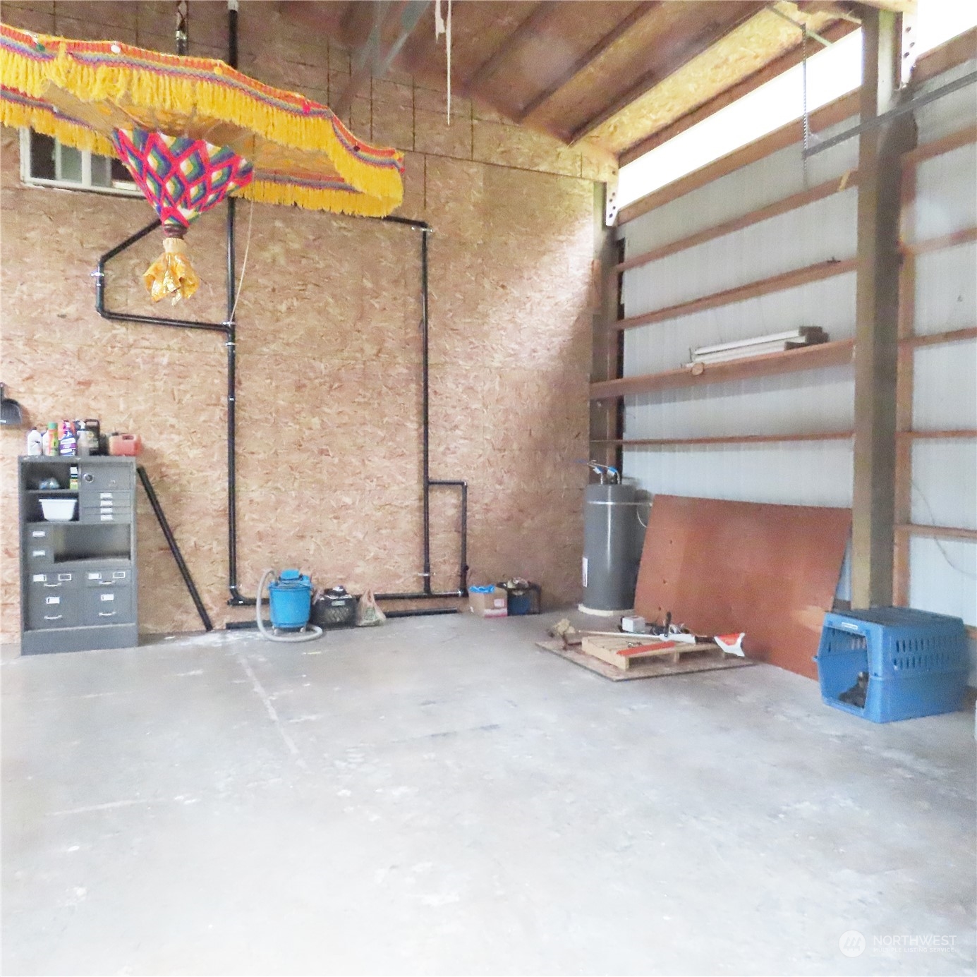 3624 Dabob Road Quilcene, WA 98376 - Photo 29 of 37 a view of an empty room with wooden floor and windows
