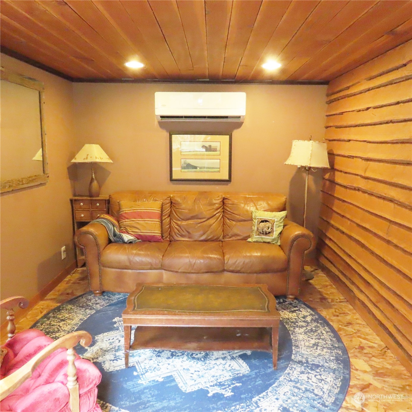 3624 Dabob Road Quilcene, WA 98376 - Photo 7 of 37 a living room with furniture and a rug
