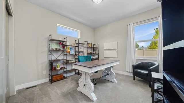 a room with furniture and a window