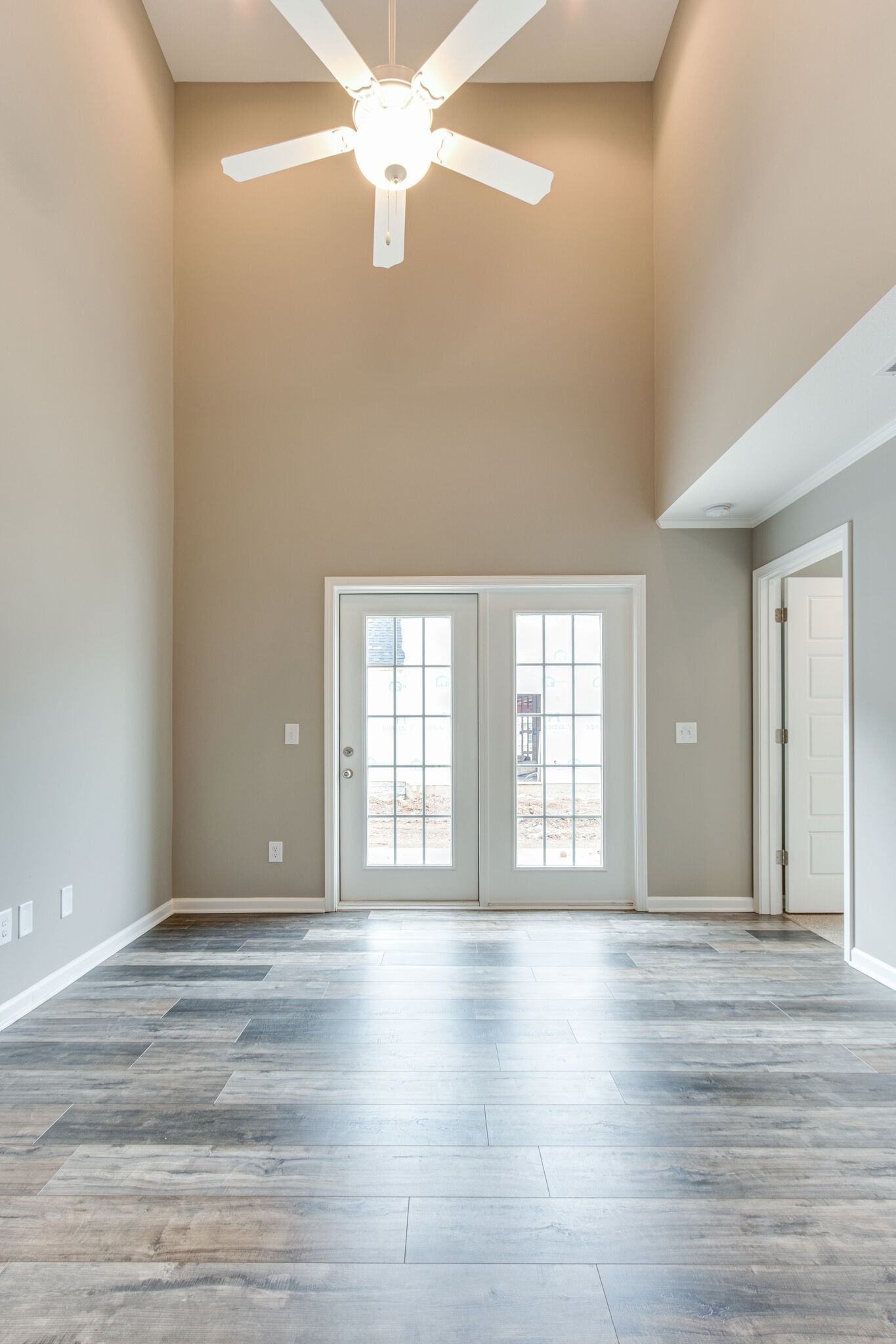3524 Learning Lane Murfreesboro, TN 37128 - Photo 2 of 14 an empty room with wooden floor and windows