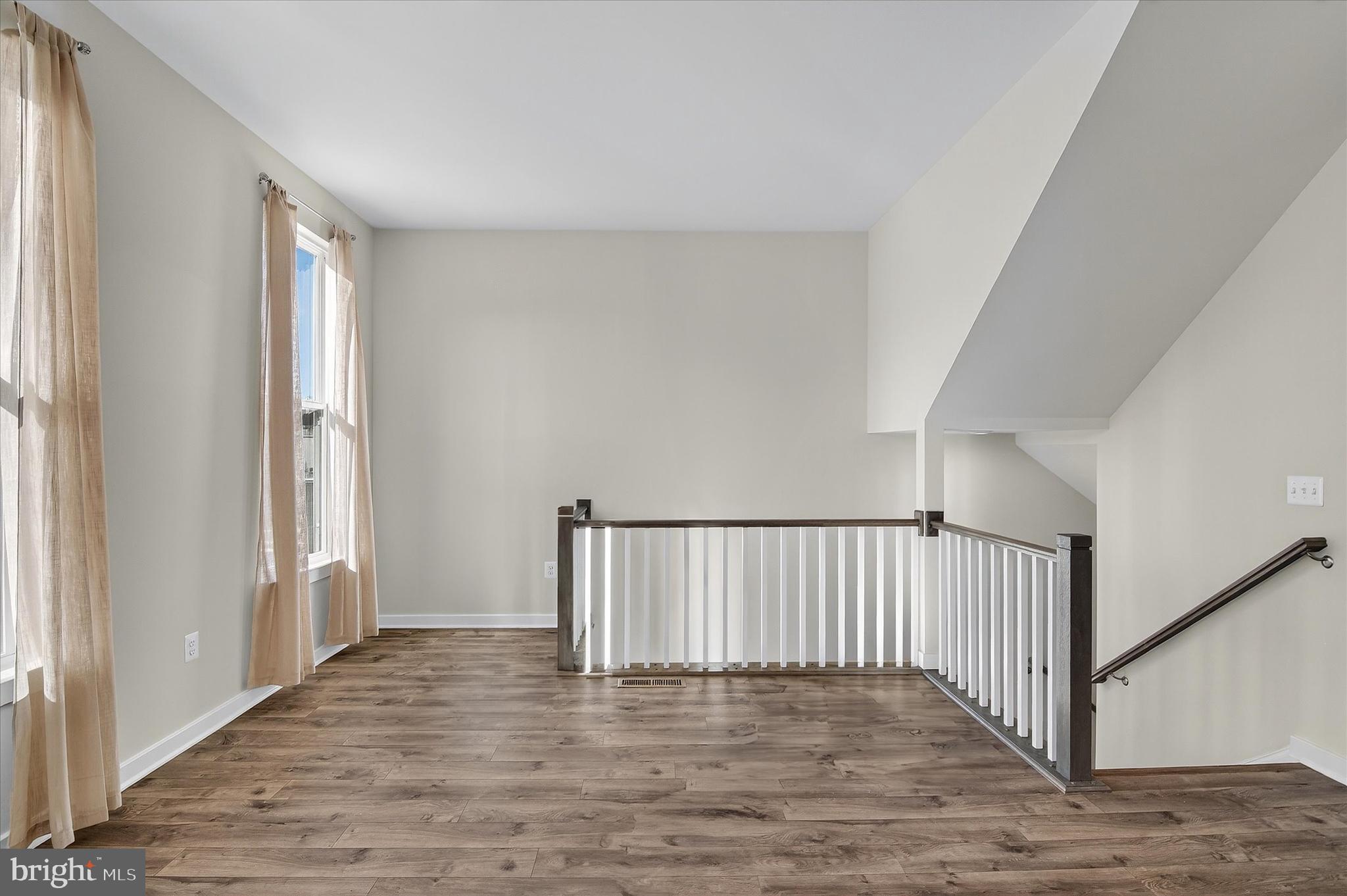 1681 Aspen Poplar Road Dumfries, VA 22026 - Photo 11 of 36 a view of entryway with wooden floor