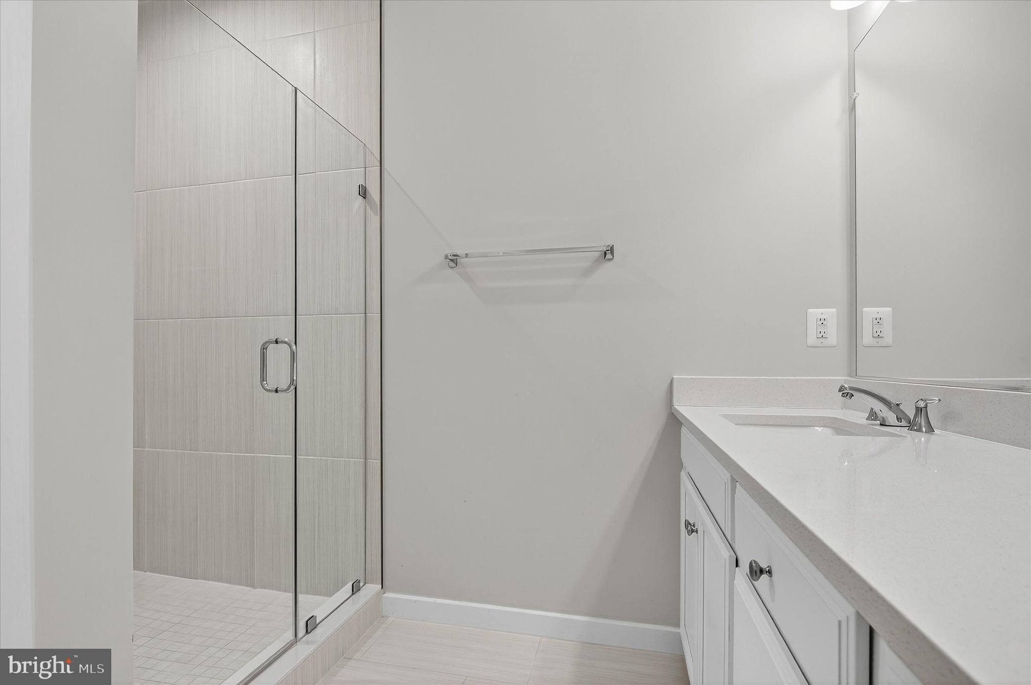 1681 Aspen Poplar Road Dumfries, VA 22026 - Photo 19 of 36 a bathroom with a sink and vanity