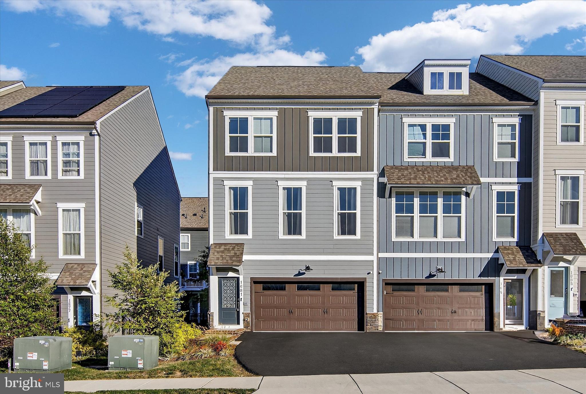 1681 Aspen Poplar Road Dumfries, VA 22026 - Photo 2 of 36 a front view of multi story residential apartment building