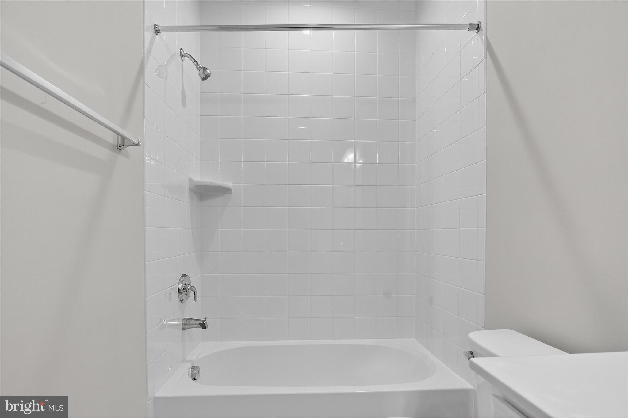 1681 Aspen Poplar Road Dumfries, VA 22026 - Photo 25 of 36 a bathroom with a shower and a bath tub