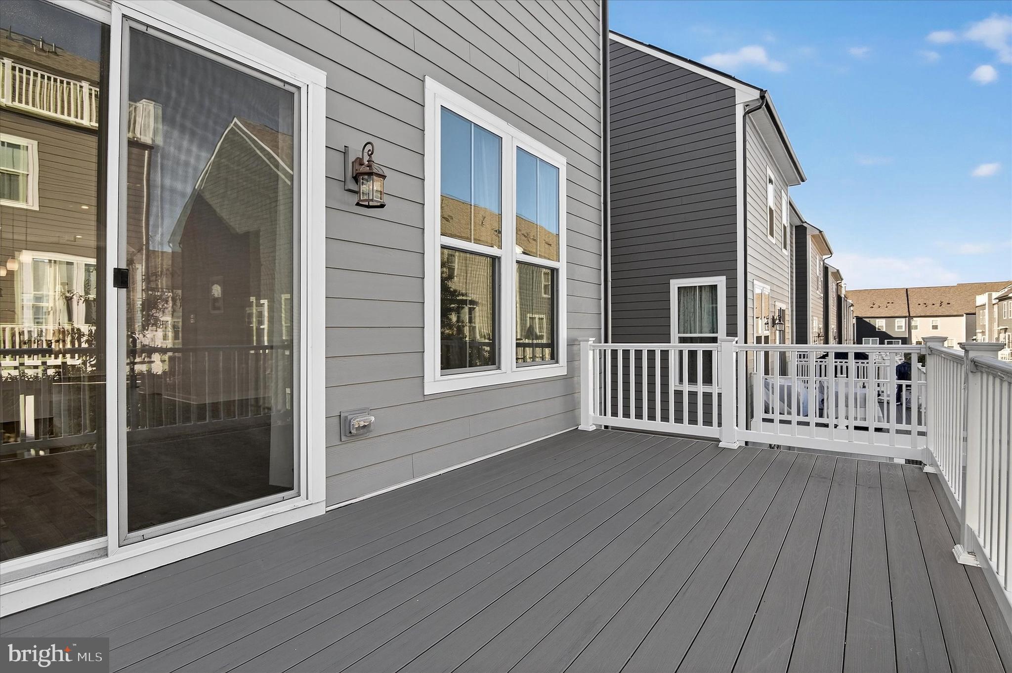 1681 Aspen Poplar Road Dumfries, VA 22026 - Photo 32 of 36 a view of a house with wooden deck