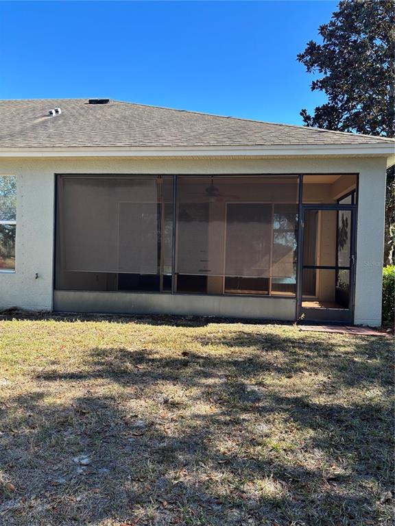 13719 Eastfork Lane Hudson, FL 34669 - Photo 12 of 17 a house with a outdoor space