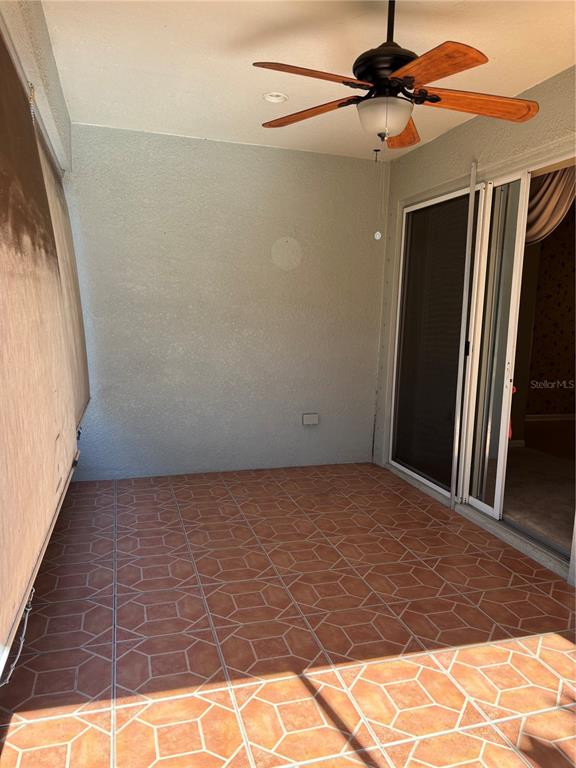 13719 Eastfork Lane Hudson, FL 34669 - Photo 14 of 17 a view of a room with wooden floor and windows