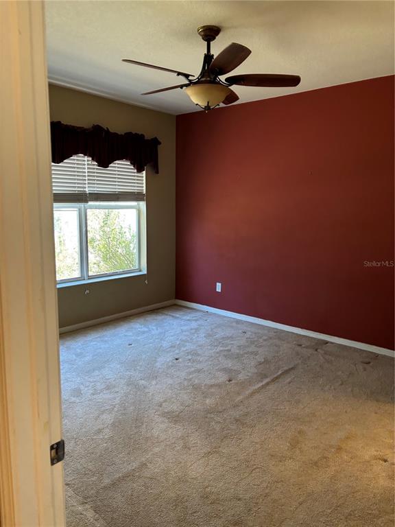 13719 Eastfork Lane Hudson, FL 34669 - Photo 8 of 17 a view of an empty room with a window