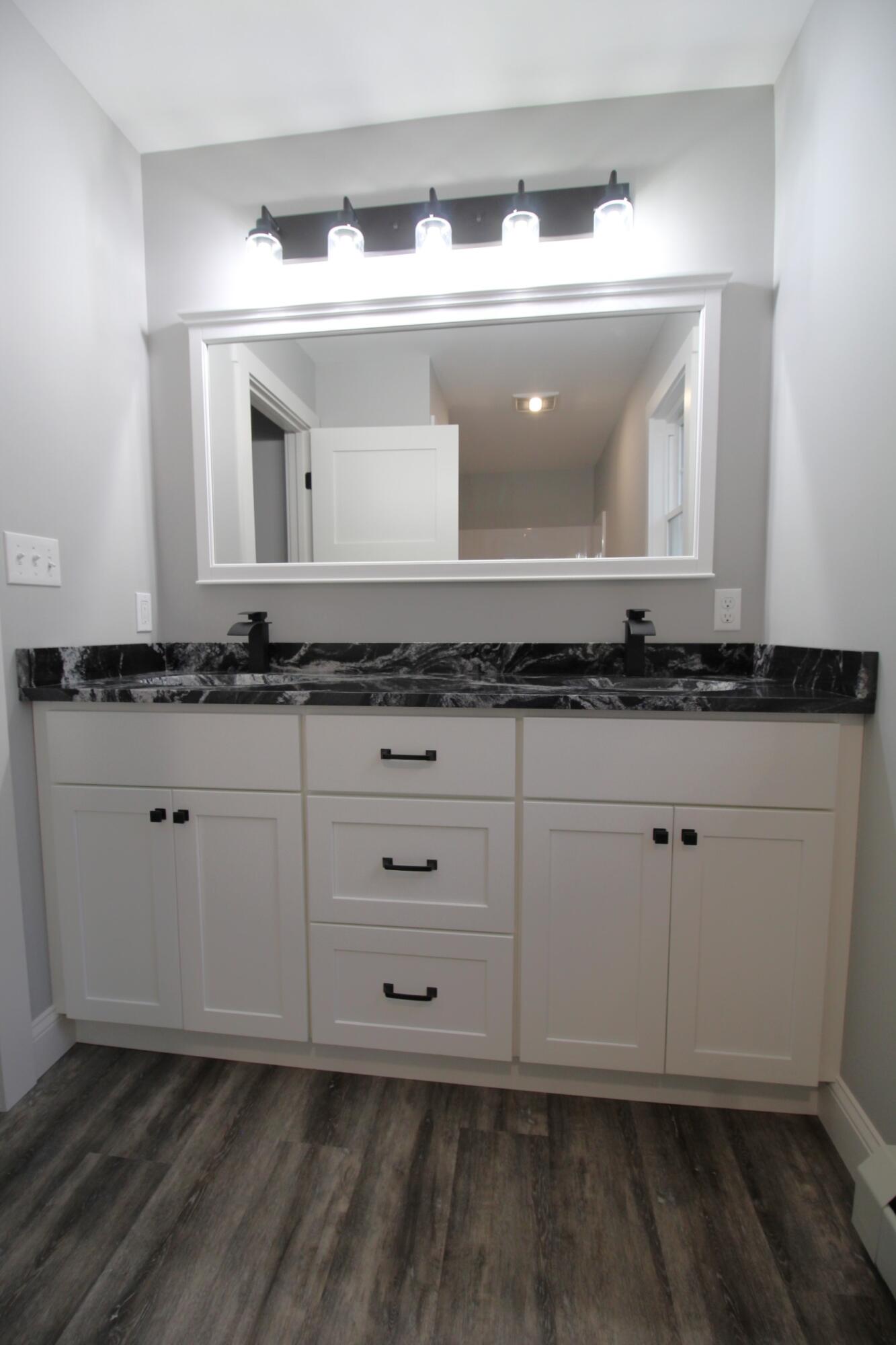 307 Cotton Road Lewiston, ME 04240 - Photo 30 of 59 Primary Bed Bathroom