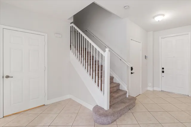 a view of entryway with stairs