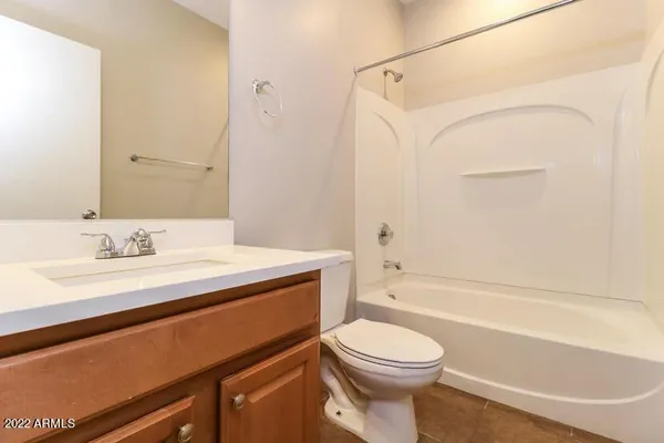 a bathroom with a sink a toilet and a bathtub