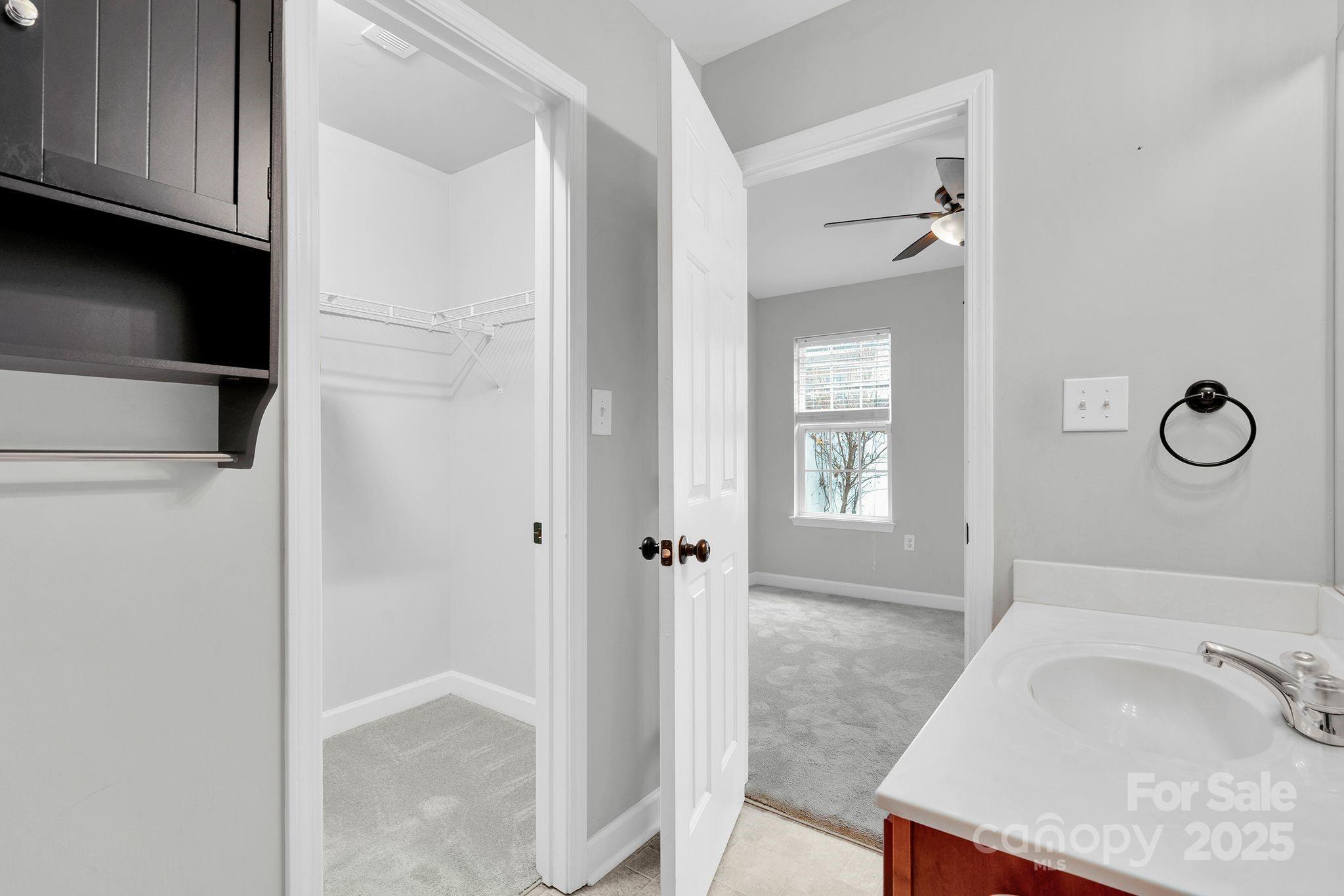 743 Waterfall Way Clover, SC 29710 - Photo 12 of 20 a bathroom with a granite countertop sink a toilet and shower