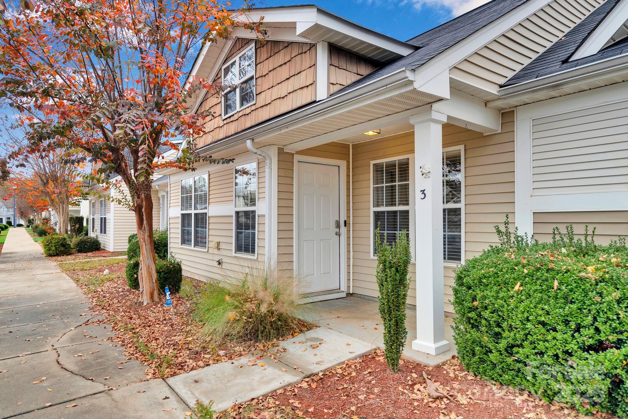 743 Waterfall Way Clover, SC 29710 - Photo 2 of 20 a front view of a house with garden