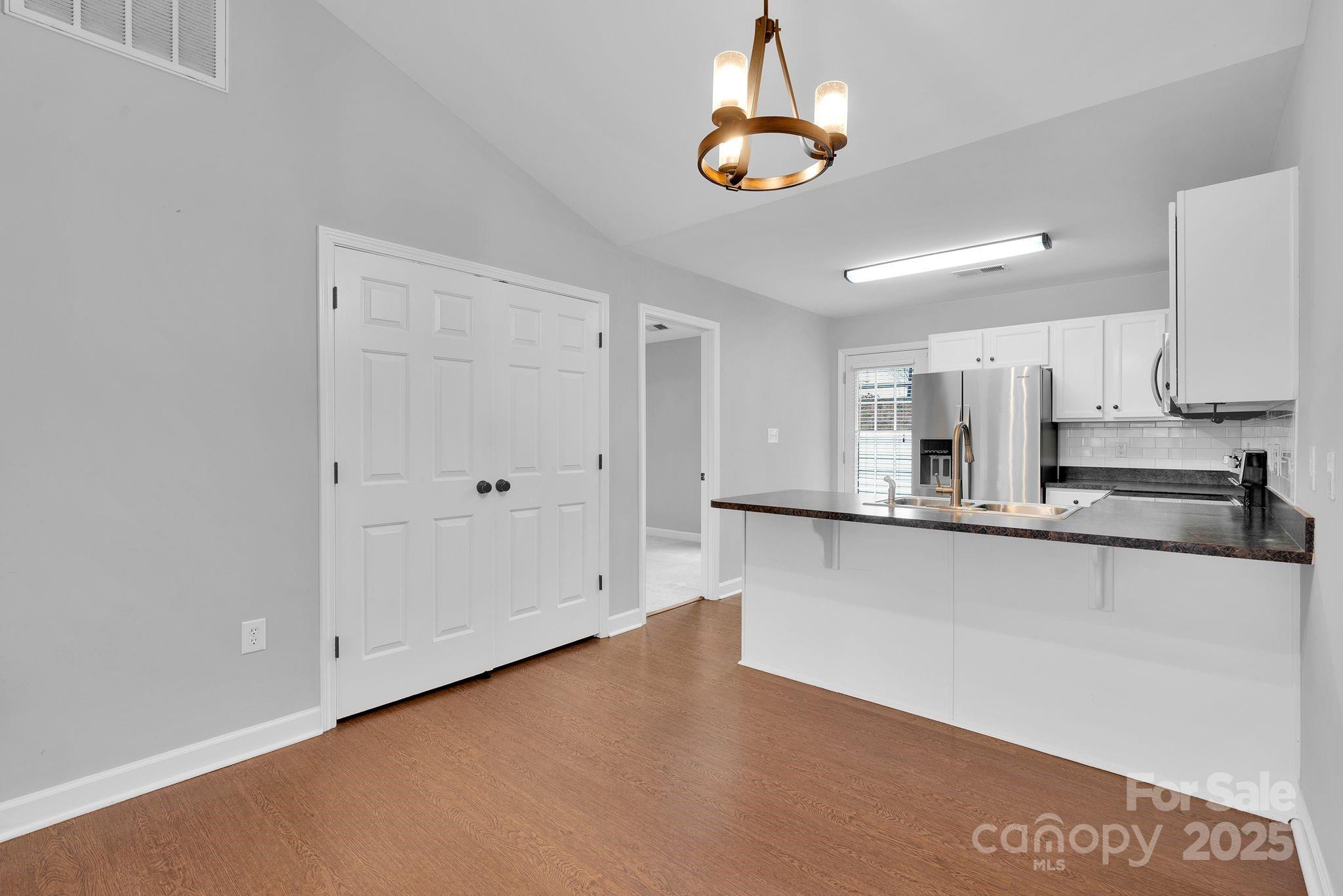 743 Waterfall Way Clover, SC 29710 - Photo 5 of 20 a kitchen with stainless steel appliances a refrigerator and microwave