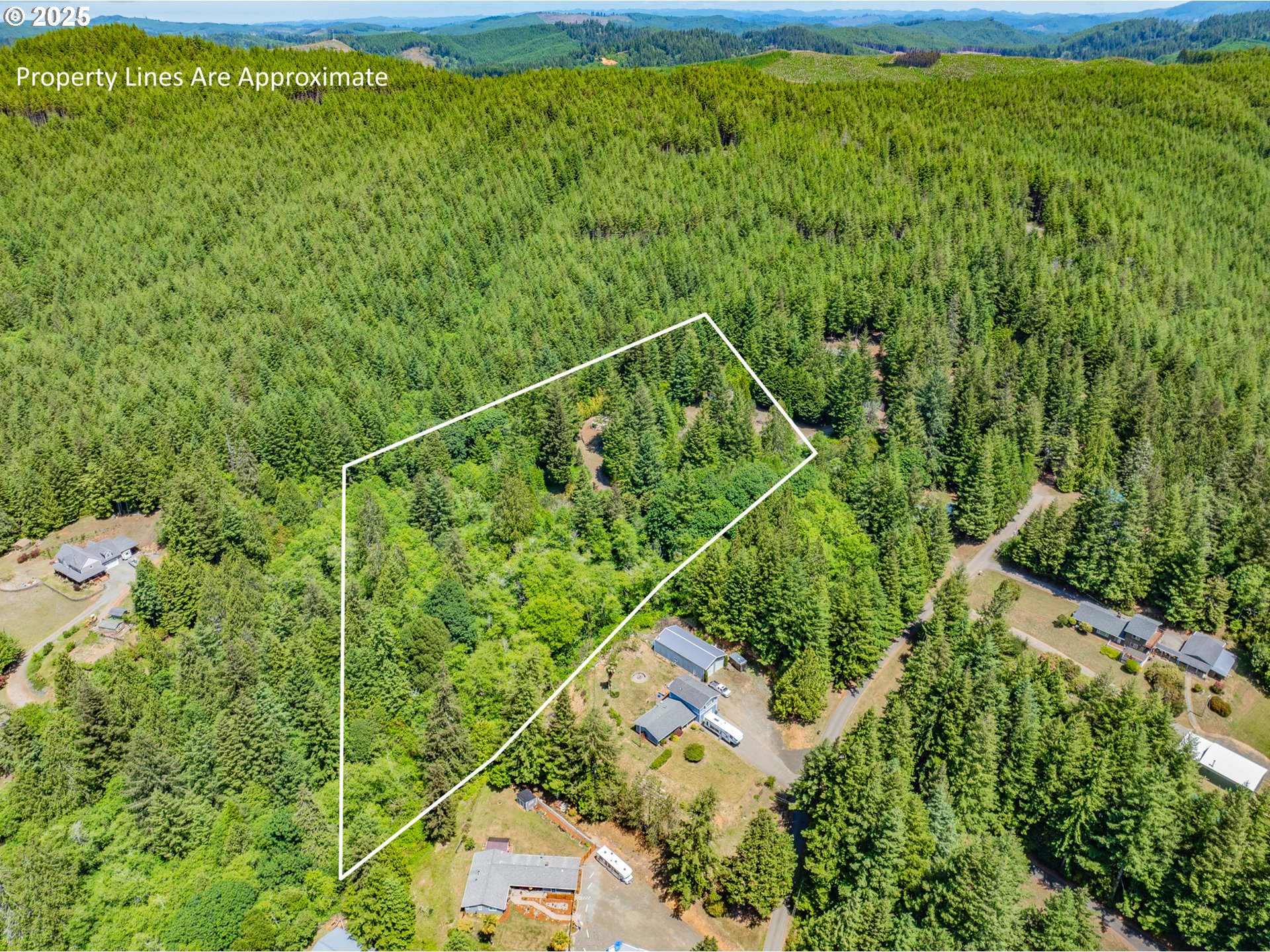 58812 Garden Valley Road Coquille, OR 97423 - Photo 1 of 36 an aerial view of residential houses with outdoor space and trees