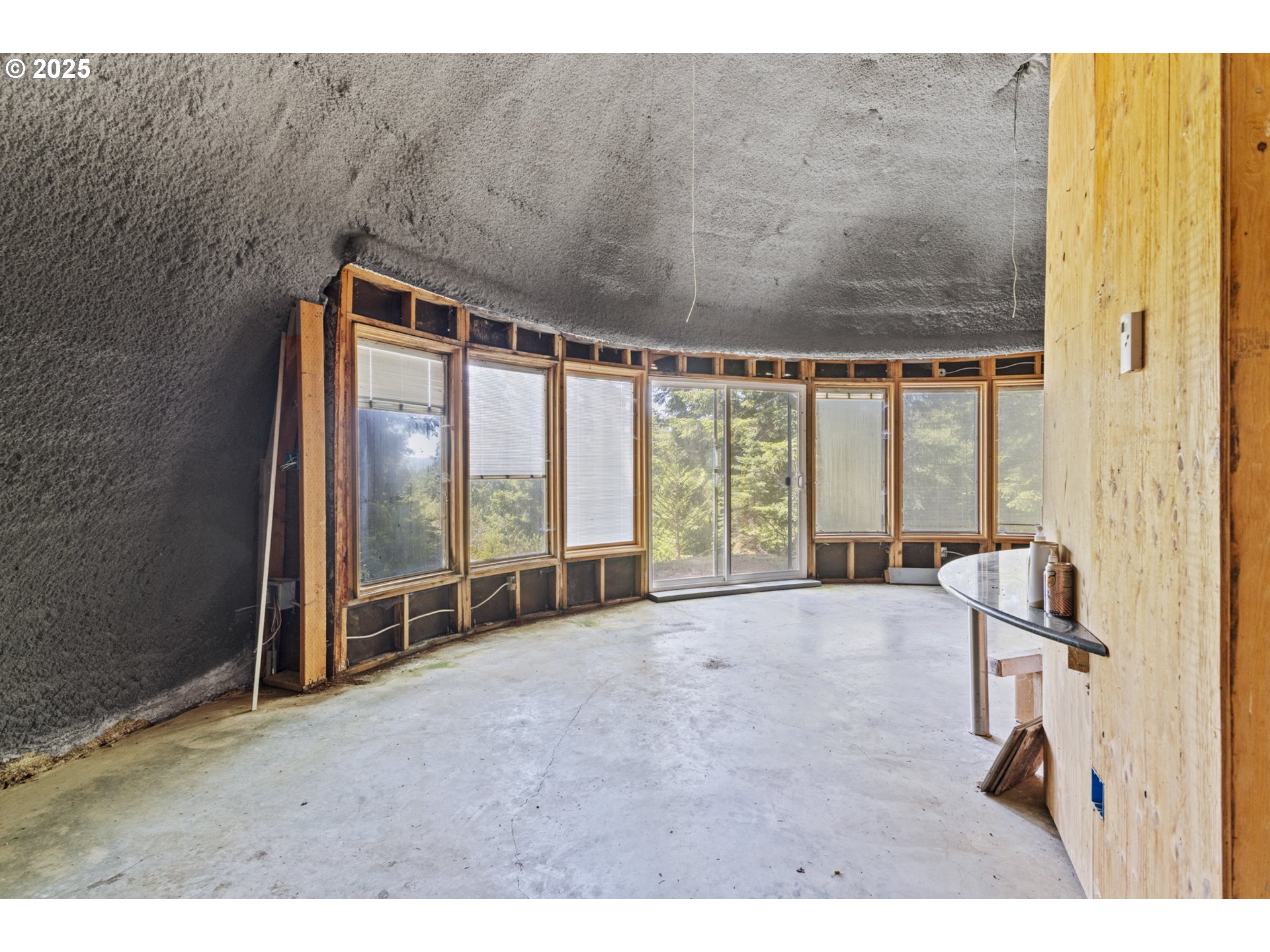 58812 Garden Valley Road Coquille, OR 97423 - Photo 19 of 36 a view of an empty room with a window