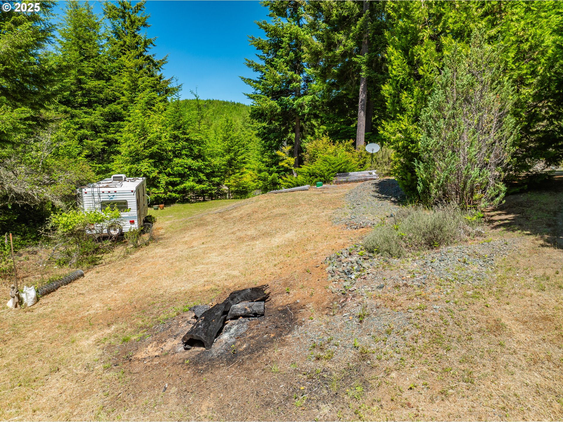 58812 Garden Valley Road Coquille, OR 97423 - Photo 7 of 36 a view of a backyard of a house