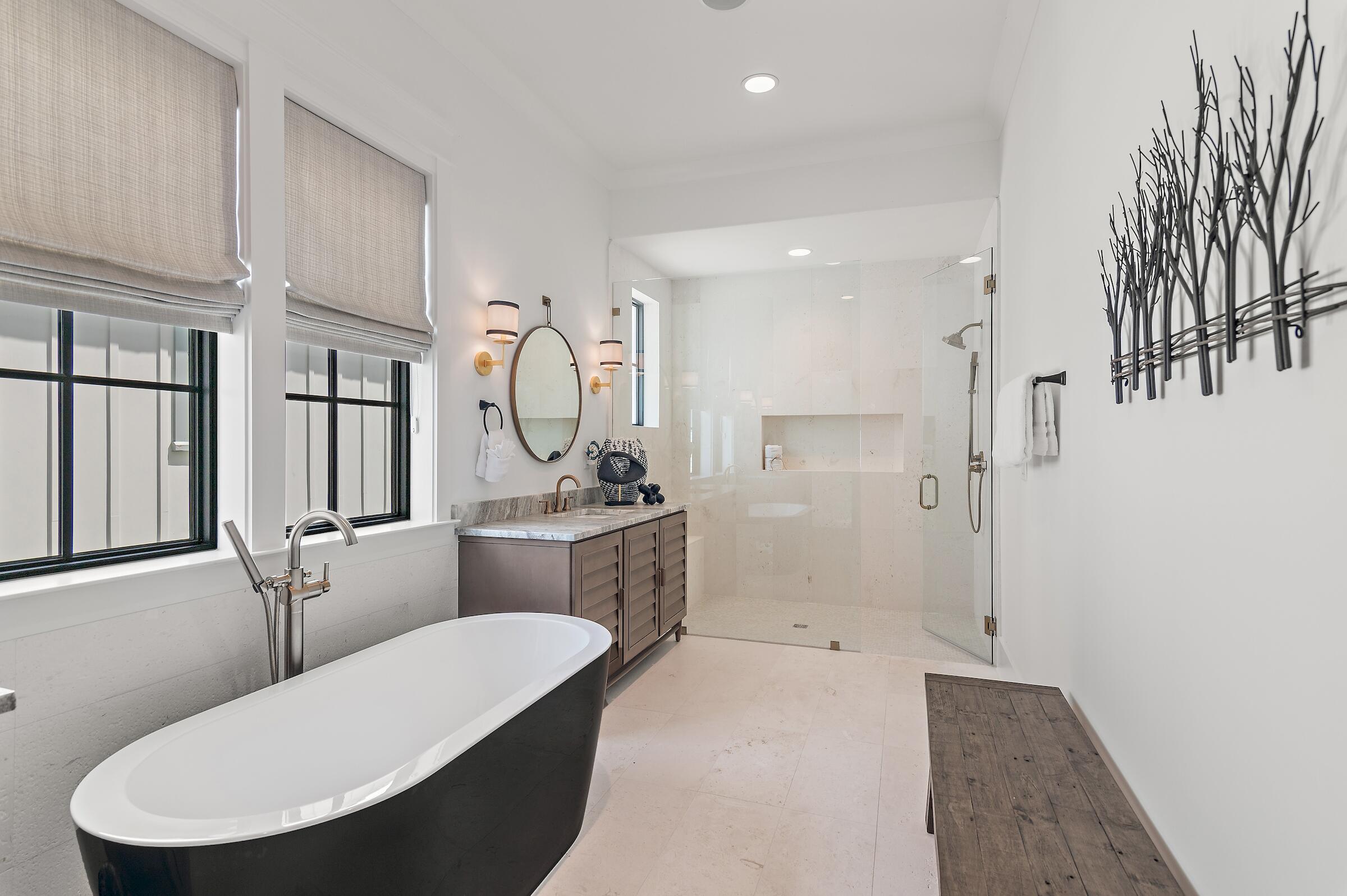 71 Grande Pointe Drive Inlet Beach, FL 32461 - Photo 29 of 48 a bathroom with a granite countertop sink mirror bathtub and toilet