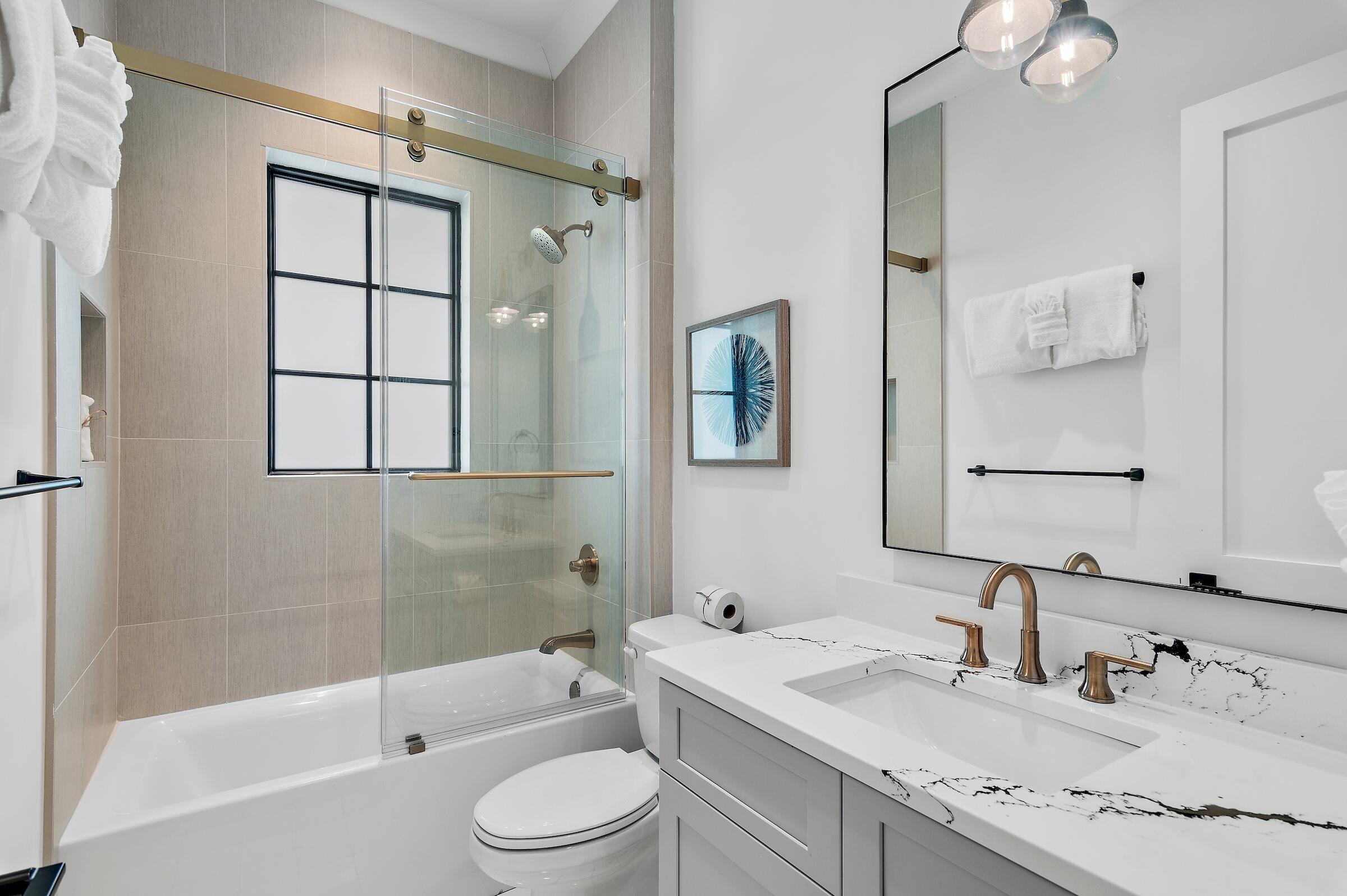 71 Grande Pointe Drive Inlet Beach, FL 32461 - Photo 32 of 48 a bathroom with a granite countertop sink toilet and shower