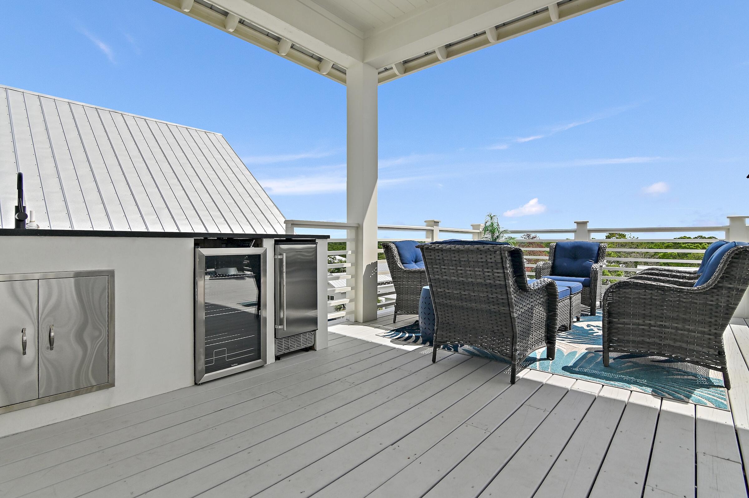 71 Grande Pointe Drive Inlet Beach, FL 32461 - Photo 10 of 48 a view of a balcony with chairs