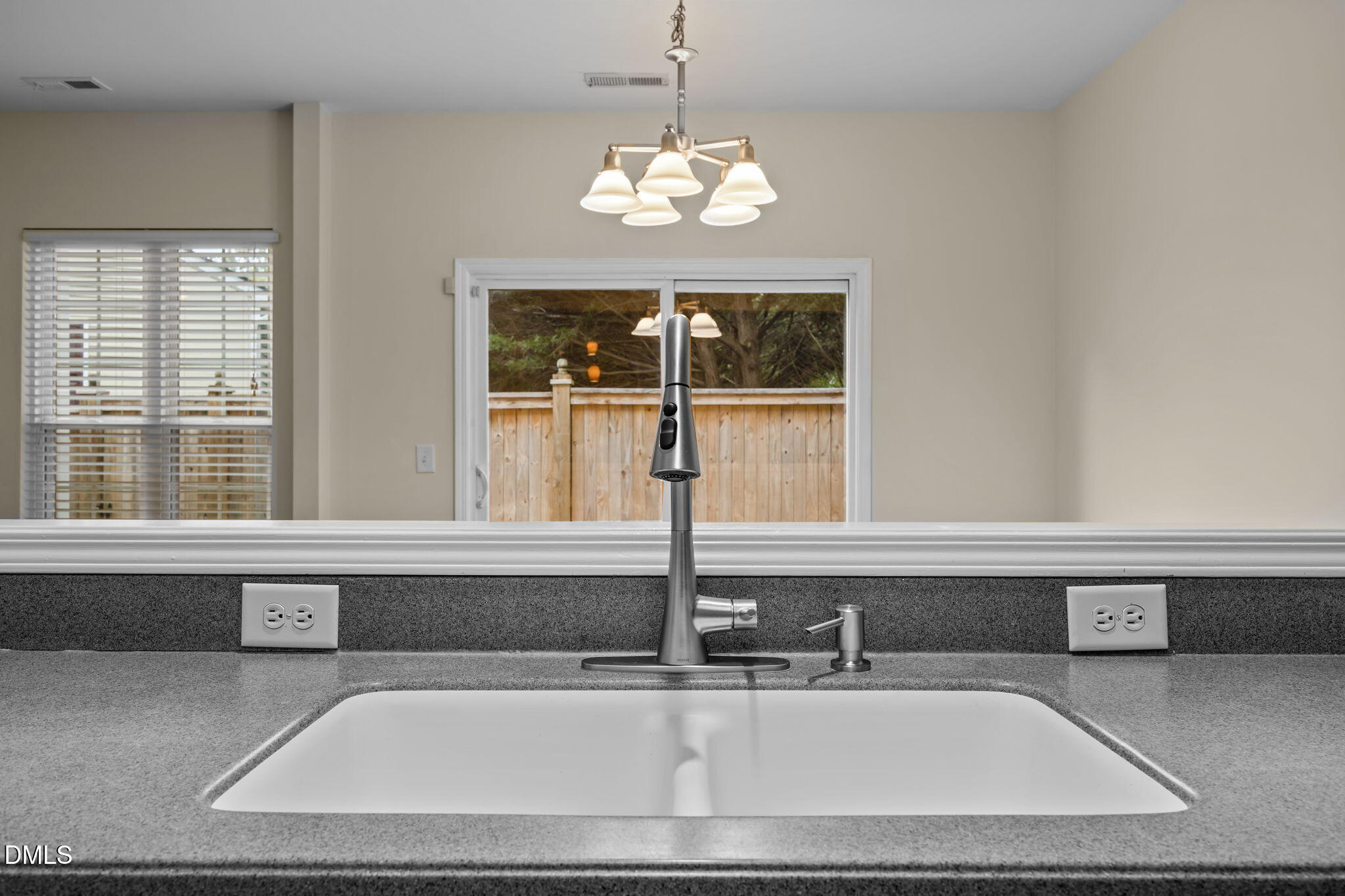 7805 Jeffrey Alan Court Raleigh, NC 27613 - Photo 16 of 46 a kitchen with a sink and a window