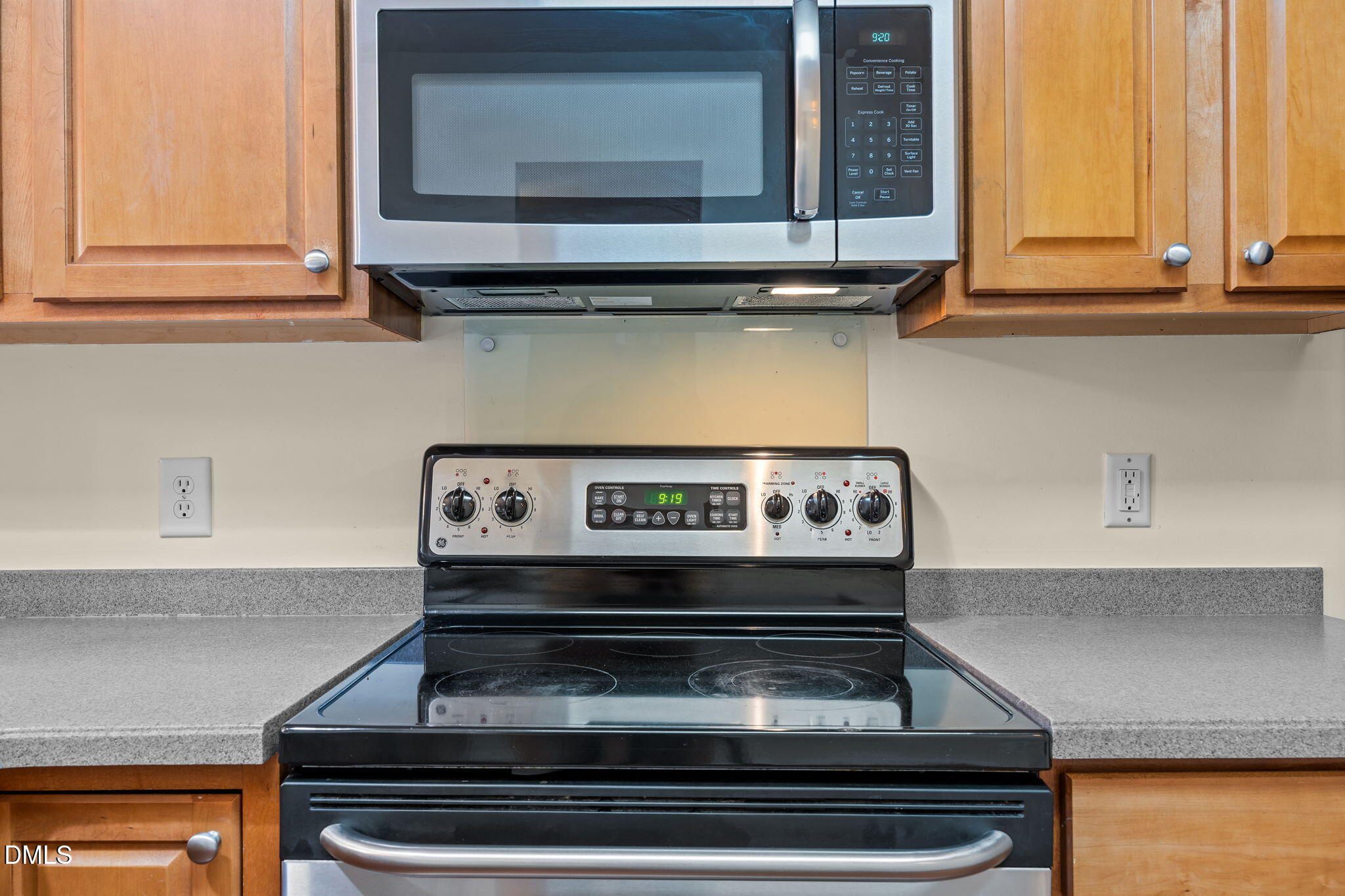 7805 Jeffrey Alan Court Raleigh, NC 27613 - Photo 17 of 46 a stove top oven sitting inside of a kitchen