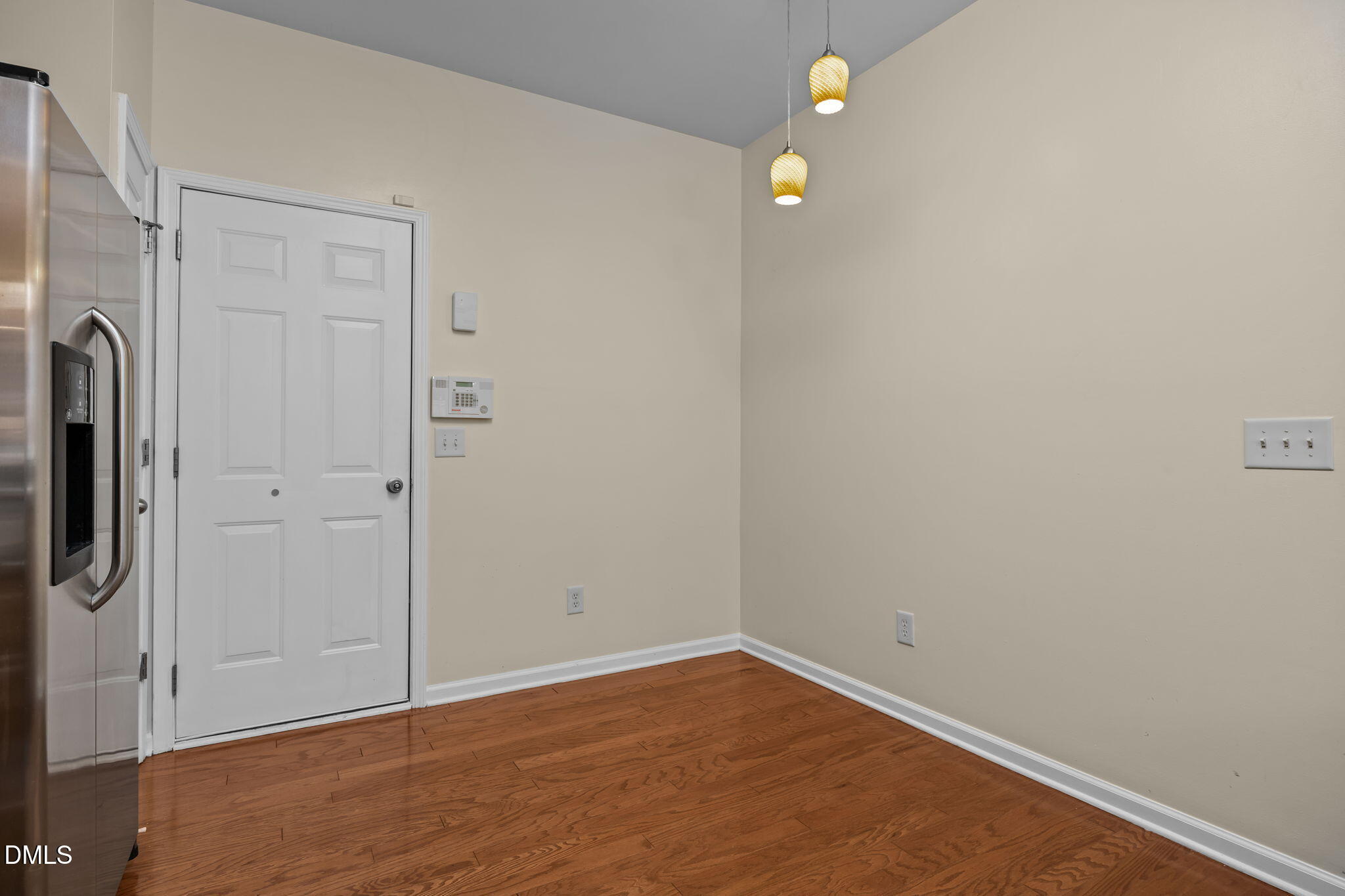 7805 Jeffrey Alan Court Raleigh, NC 27613 - Photo 18 of 46 a view of a room with wooden floor