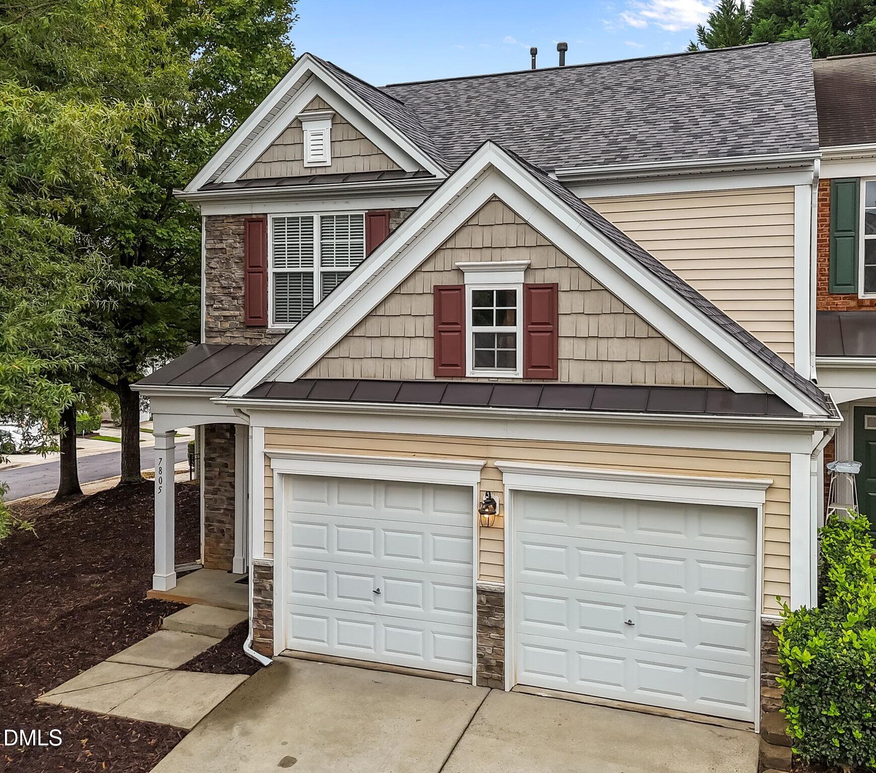 7805 Jeffrey Alan Court Raleigh, NC 27613 - Photo 2 of 46 a front view of a house with a yard