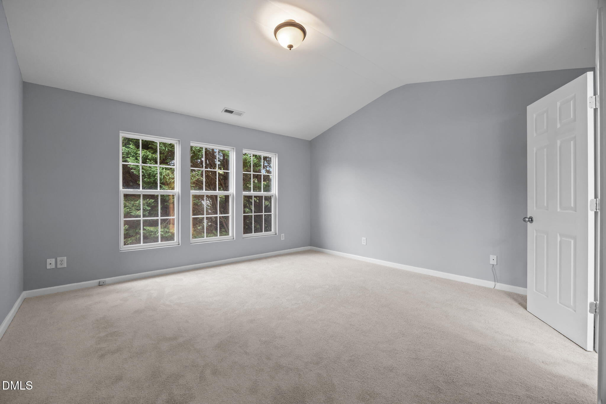 7805 Jeffrey Alan Court Raleigh, NC 27613 - Photo 21 of 46 a view of an empty room with a window