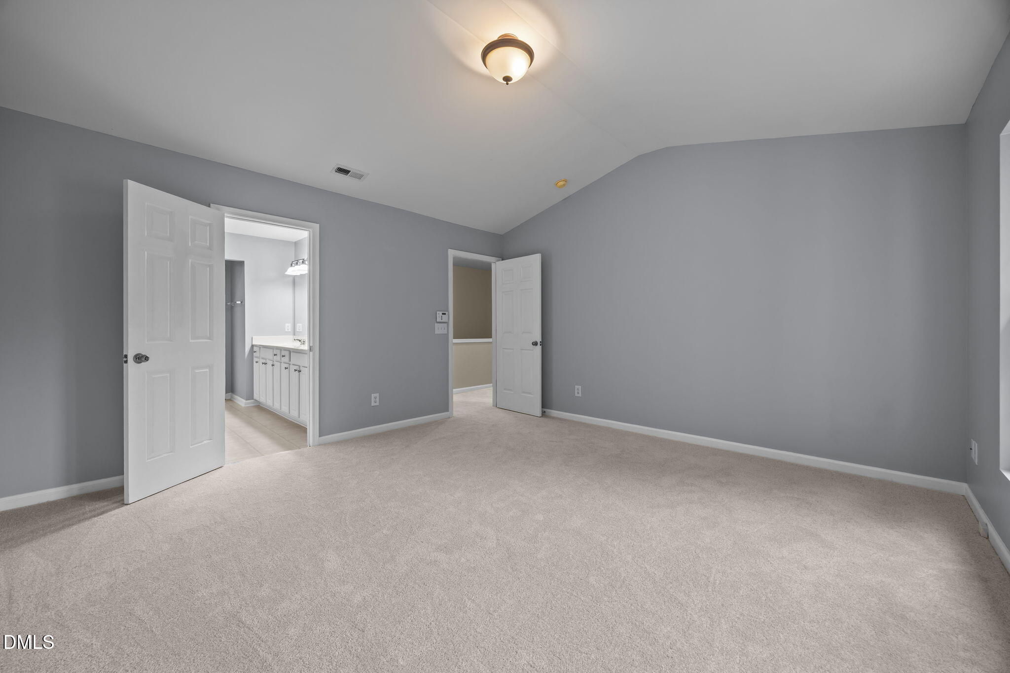 7805 Jeffrey Alan Court Raleigh, NC 27613 - Photo 22 of 46 a view of an empty room and closet area