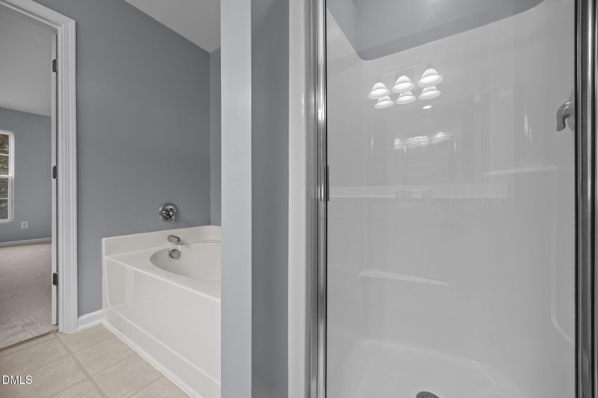 7805 Jeffrey Alan Court Raleigh, NC 27613 - Photo 25 of 46 a white bath tub sitting next to a white tub