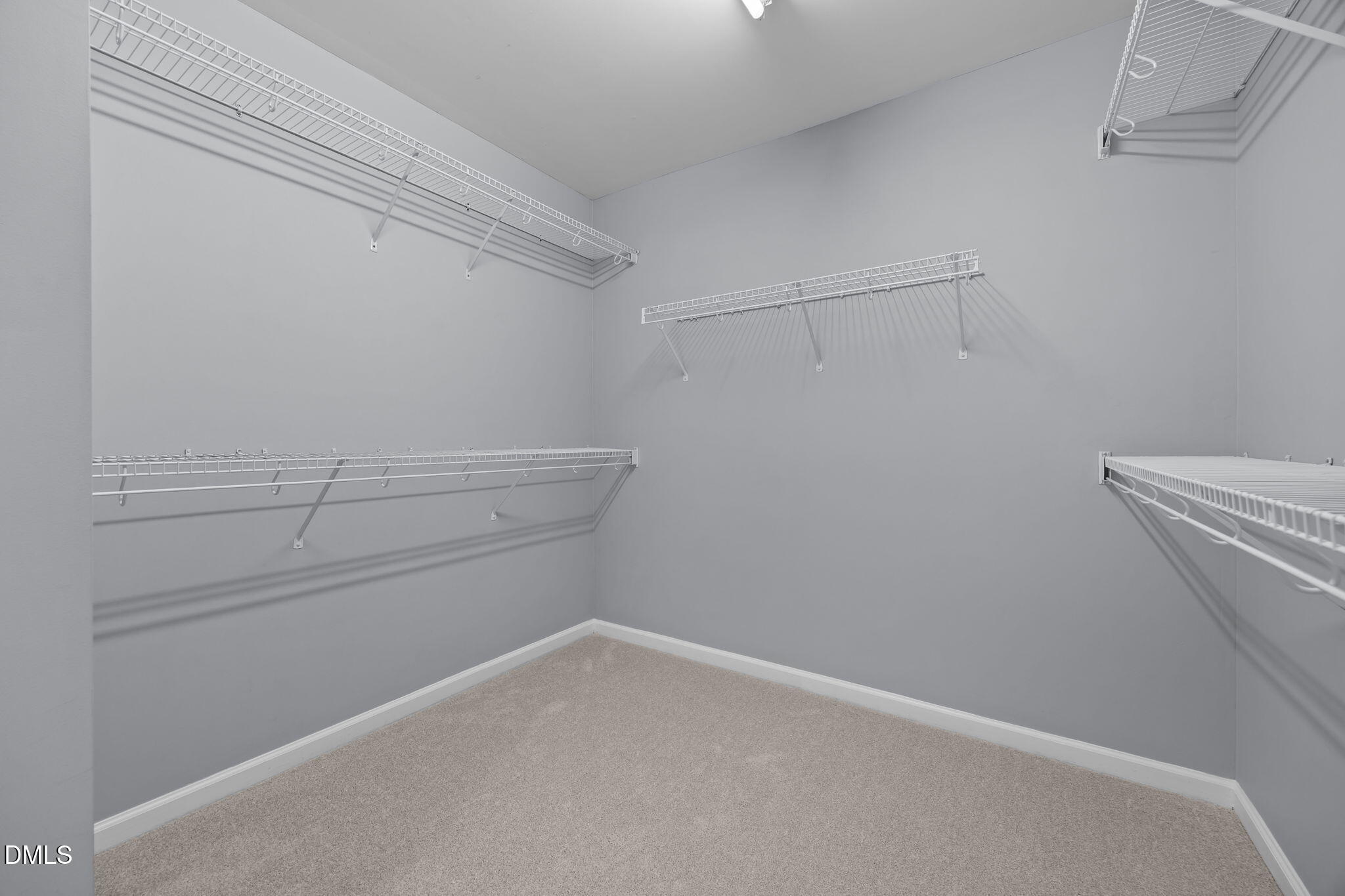 7805 Jeffrey Alan Court Raleigh, NC 27613 - Photo 26 of 46 a view of an empty walk in closet