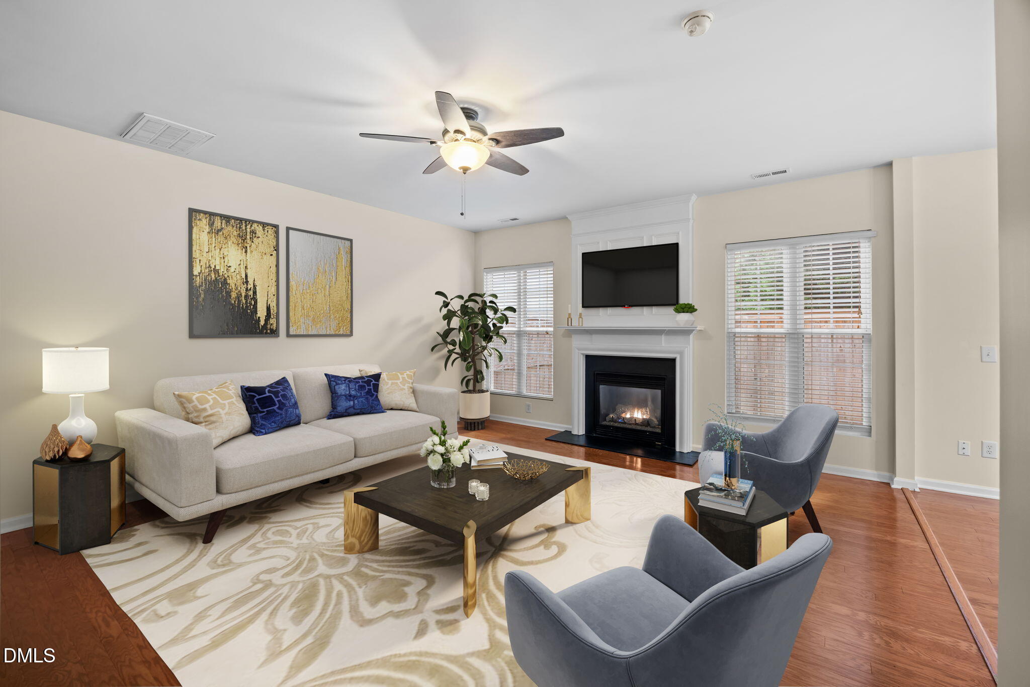 7805 Jeffrey Alan Court Raleigh, NC 27613 - Photo 7 of 46 a living room with furniture and a fireplace