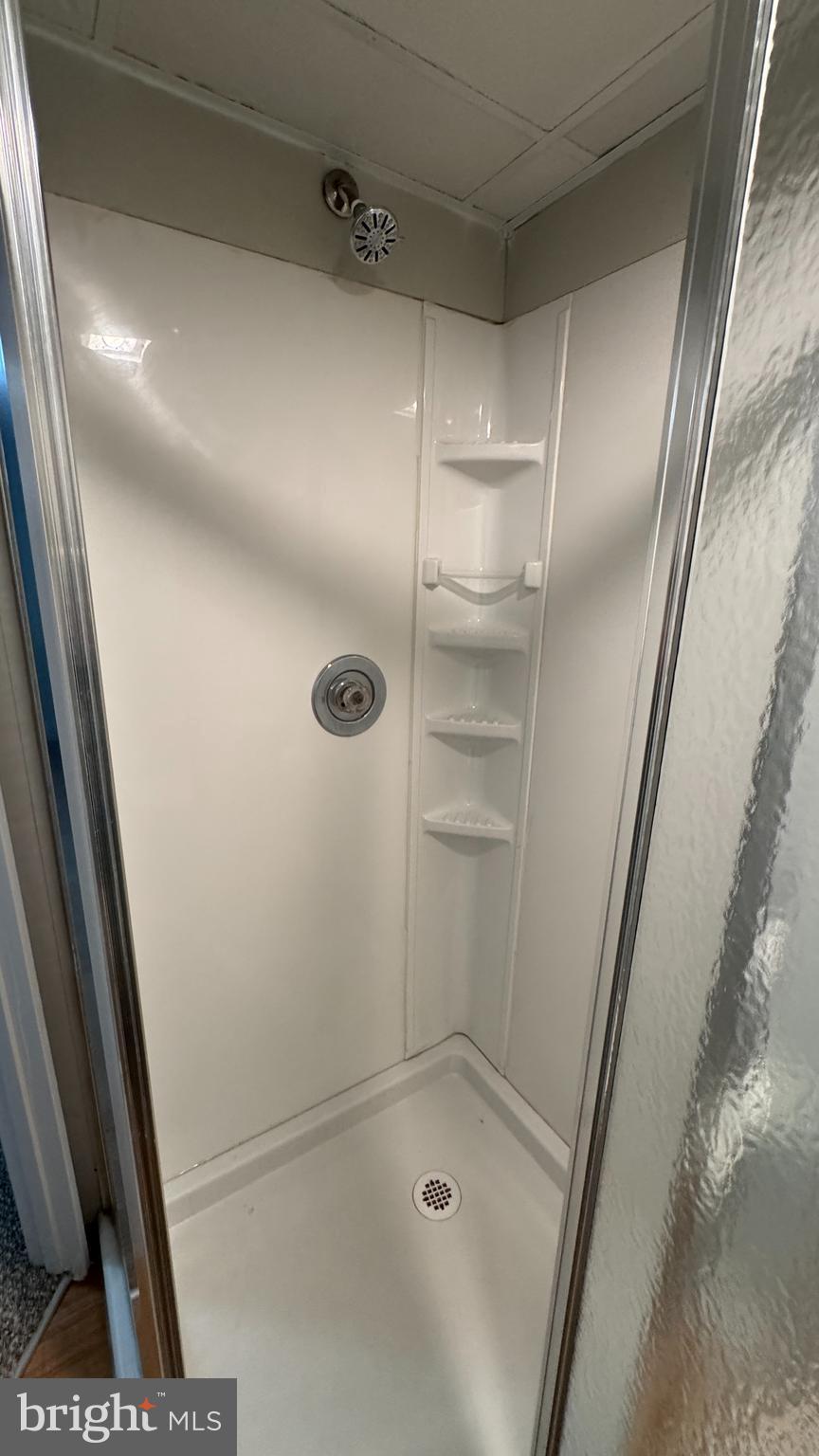 8029 Stratman Road Dundalk, MD 21222 - Photo 22 of 41 a bathroom with a shower
