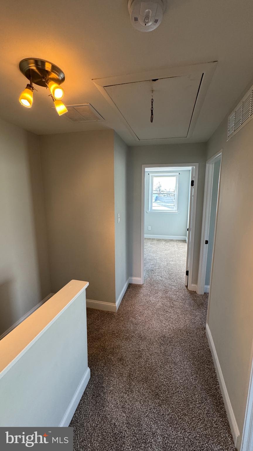 8029 Stratman Road Dundalk, MD 21222 - Photo 25 of 41 a view of hallway with window