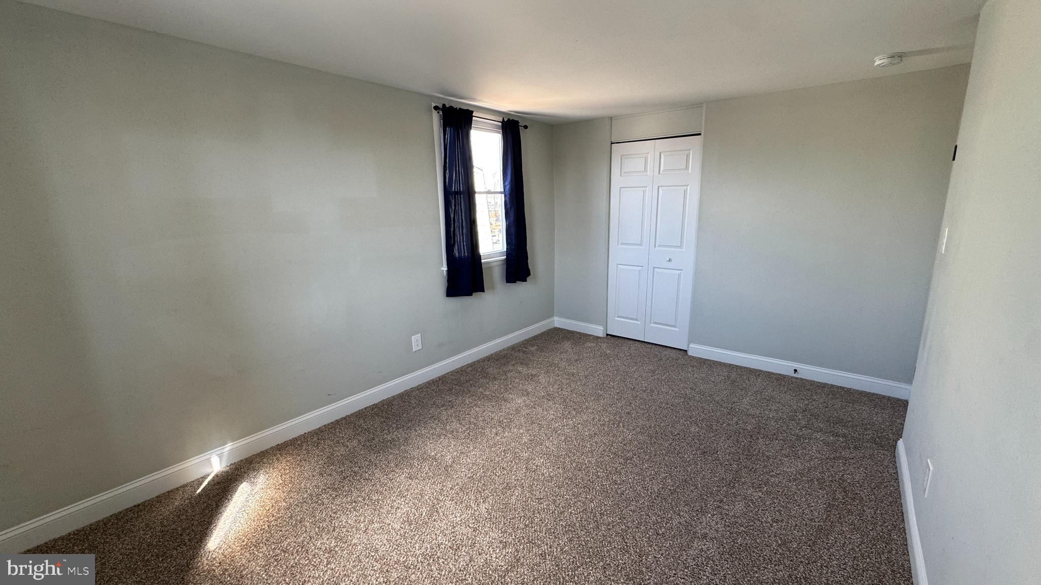 8029 Stratman Road Dundalk, MD 21222 - Photo 28 of 41 an empty room with windows