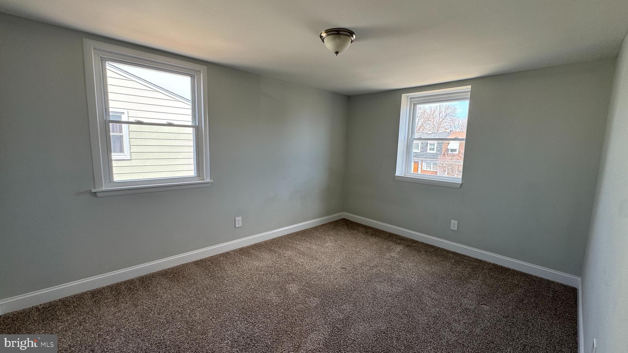 8029 Stratman Road Dundalk, MD 21222 - Photo 29 of 41 a view of an empty room with a window