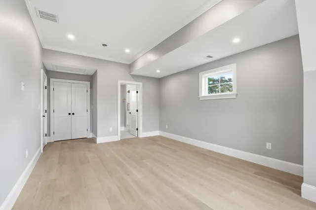 a view of balcony with wooden floor and fence