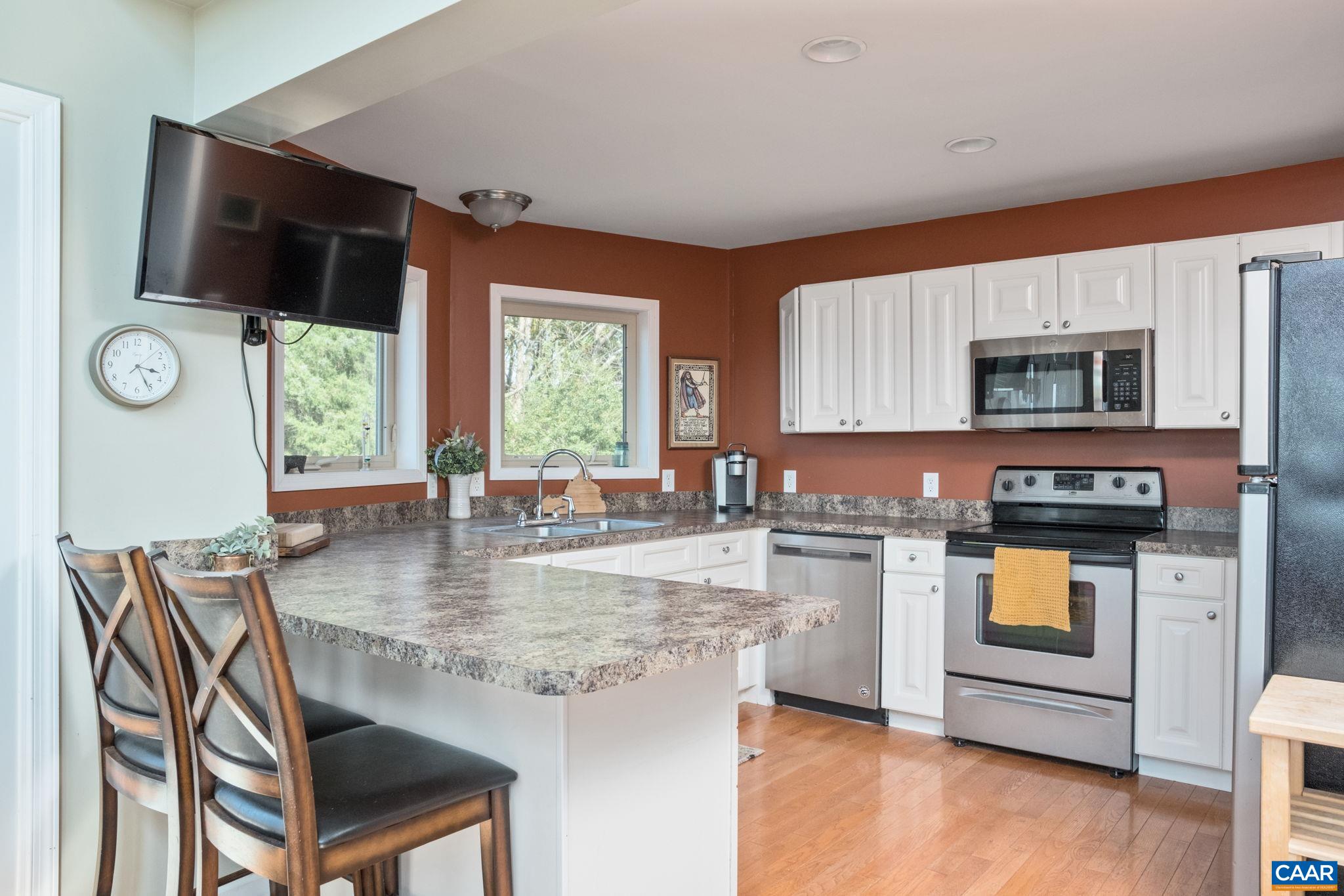 70 Percy Lane Fairfield, VA 24435 - Photo 20 of 52 a kitchen with microwave a stove and furniture