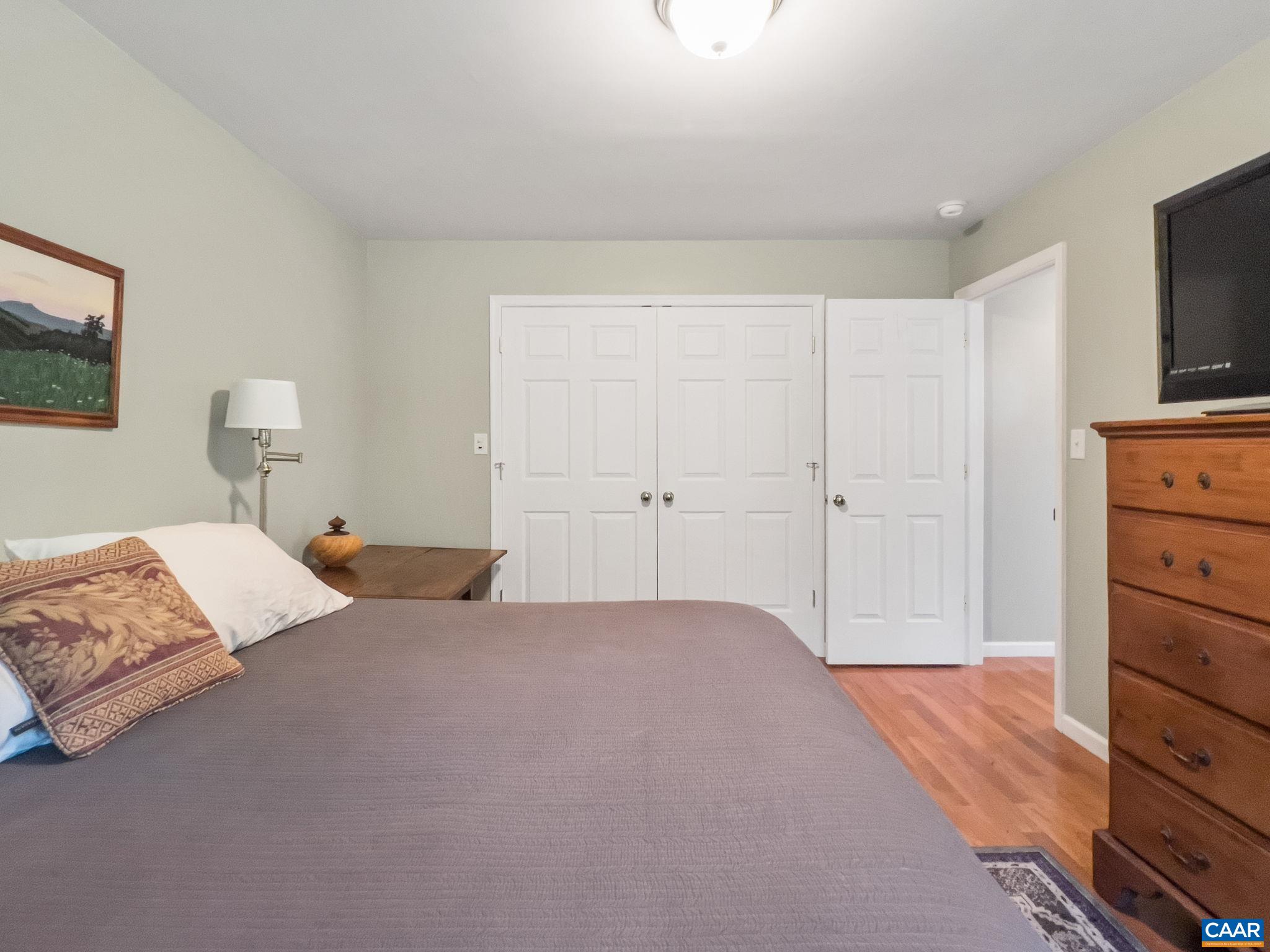 70 Percy Lane Fairfield, VA 24435 - Photo 34 of 52 a bedroom with a bed and a flat screen tv